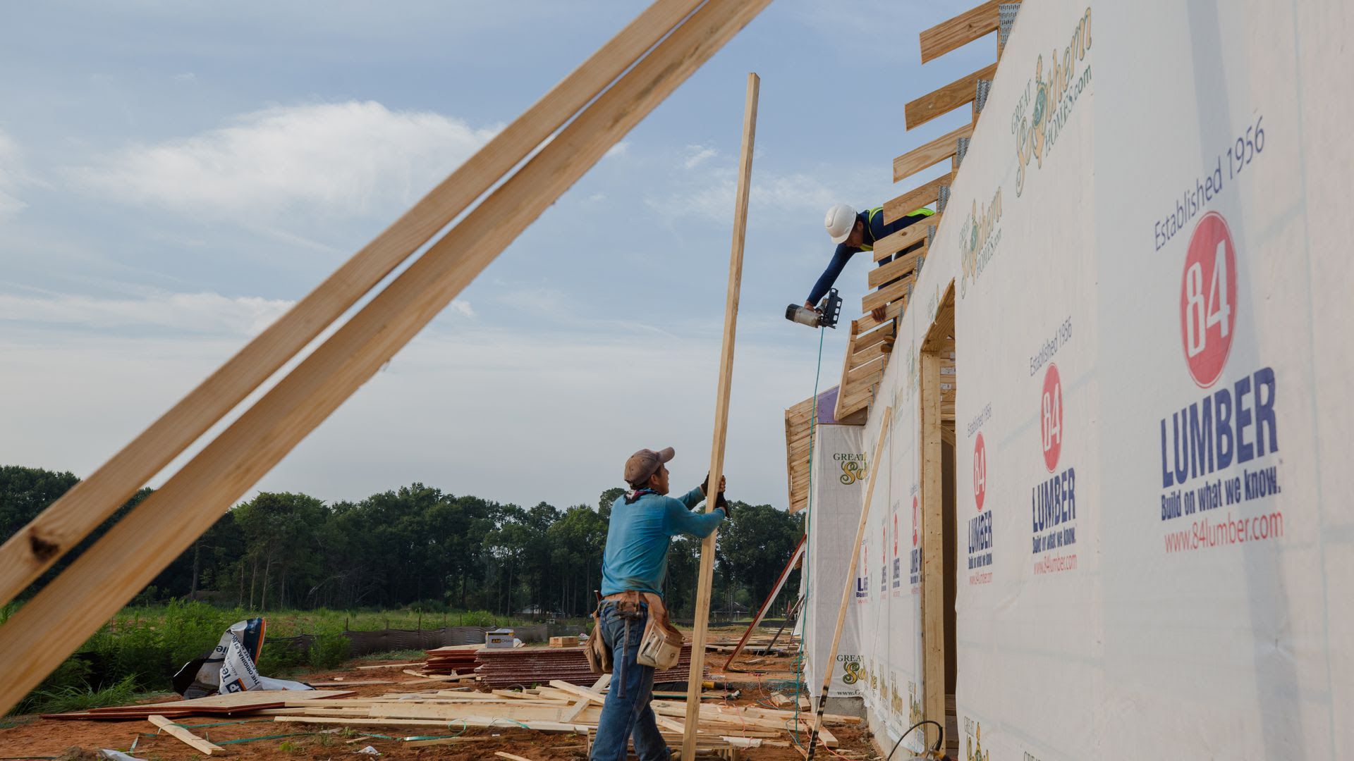 Contractors work on a home under construction in Sumter, S.C.