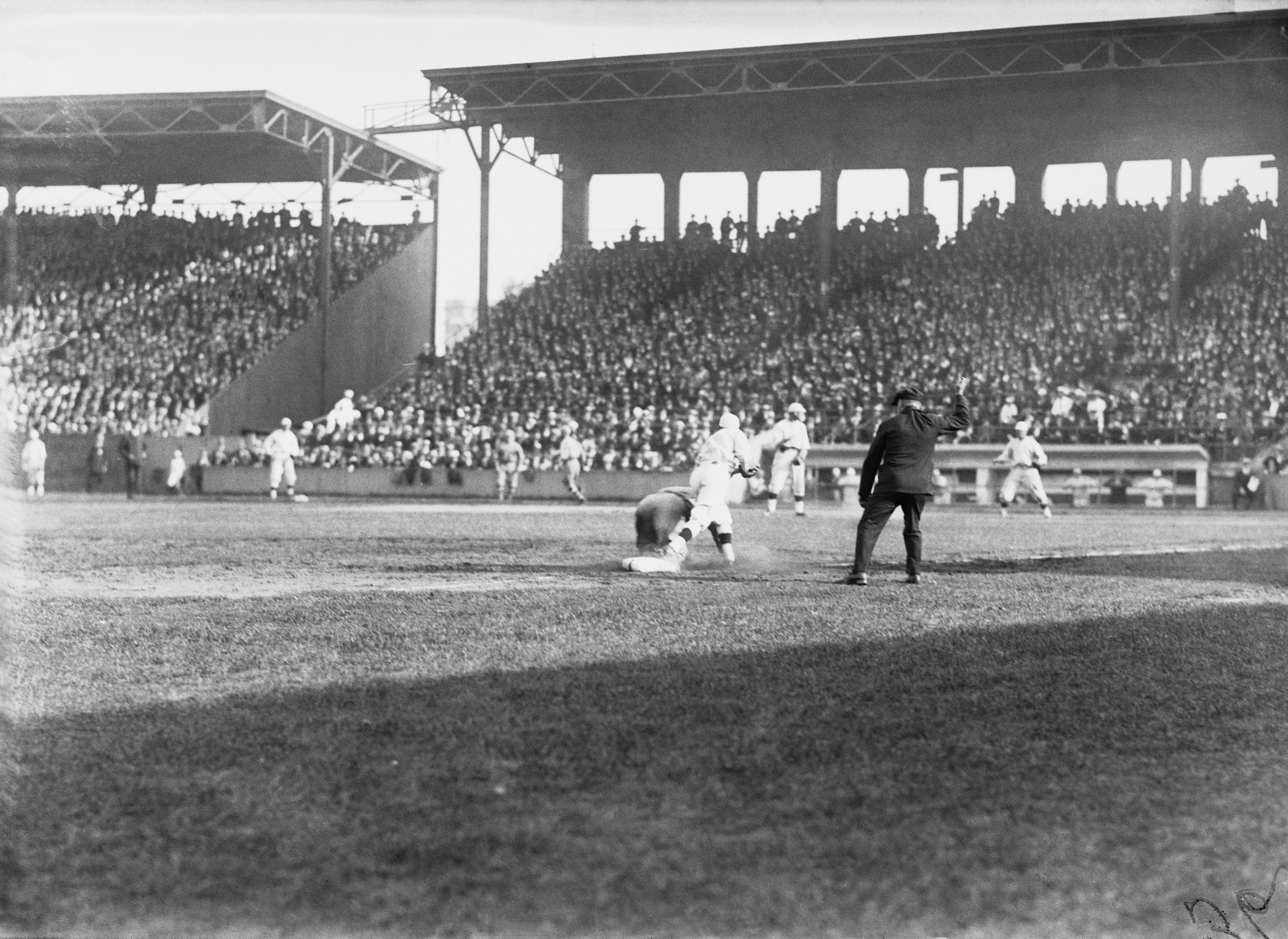 Chicago's Fred Merkle is called out at third base during Game 4 at Fenway Park.
