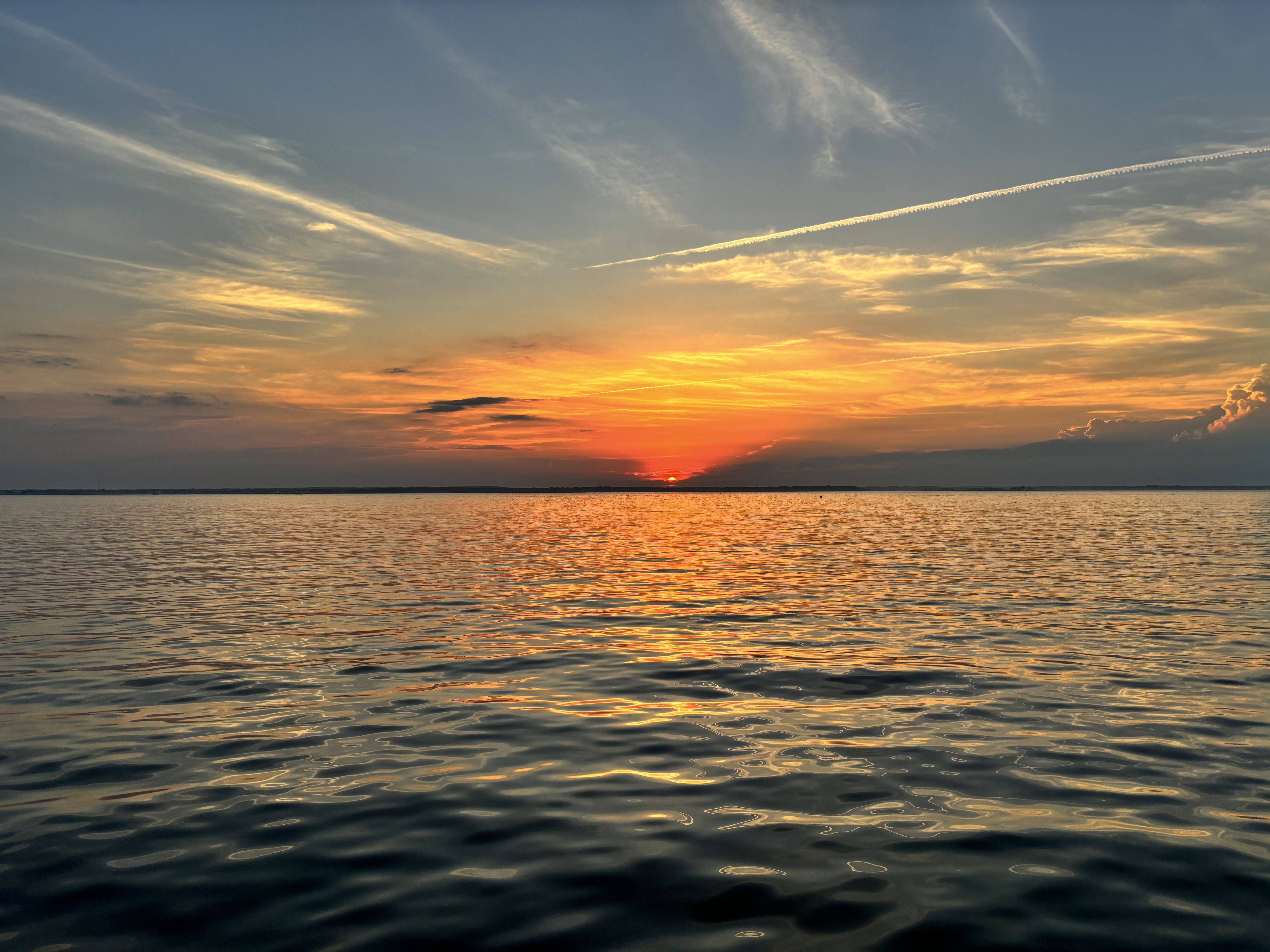 A sunset reflected over water