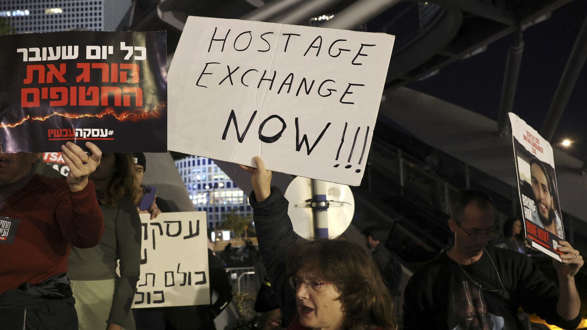 Families and supporters of hostages hostages held by Palestinian militants hold a demonstration outside the Israeli Ministry of Defense in Tel Aviv on Dec. 15. Photo: Ahmad Gharabli/AFP via Getty Images