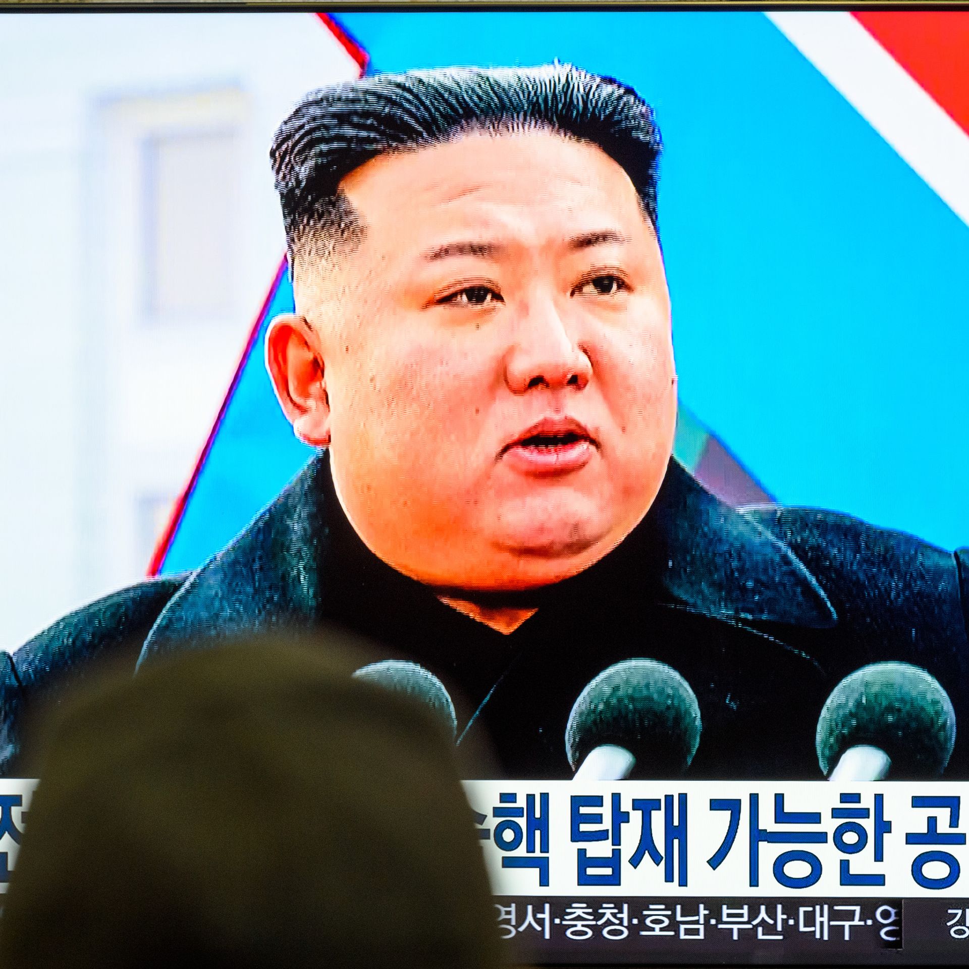  TV screen shows footage of North Korean leader Kim Jong-un during a news program at the Yongsan Railway Station in Seoul. 