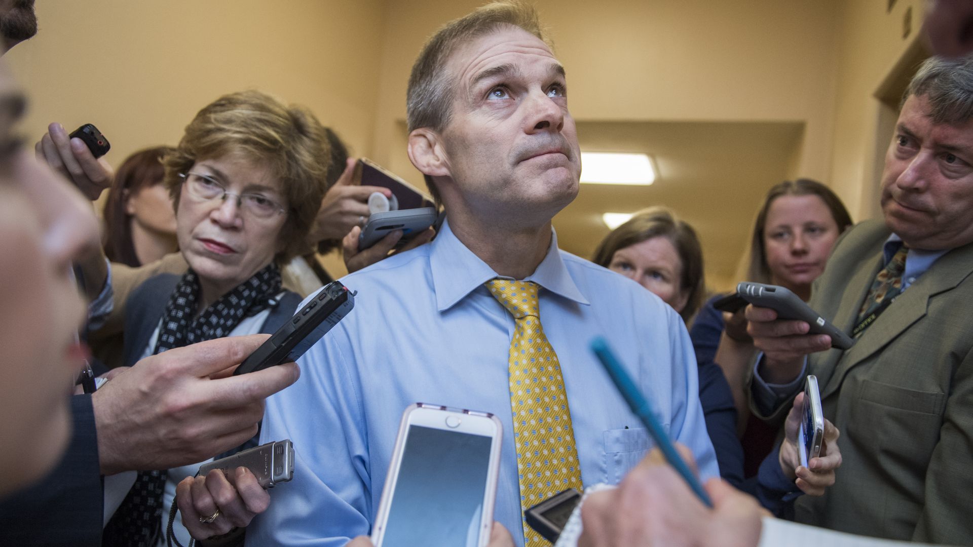 Jim Jordan speaking with reporters.
