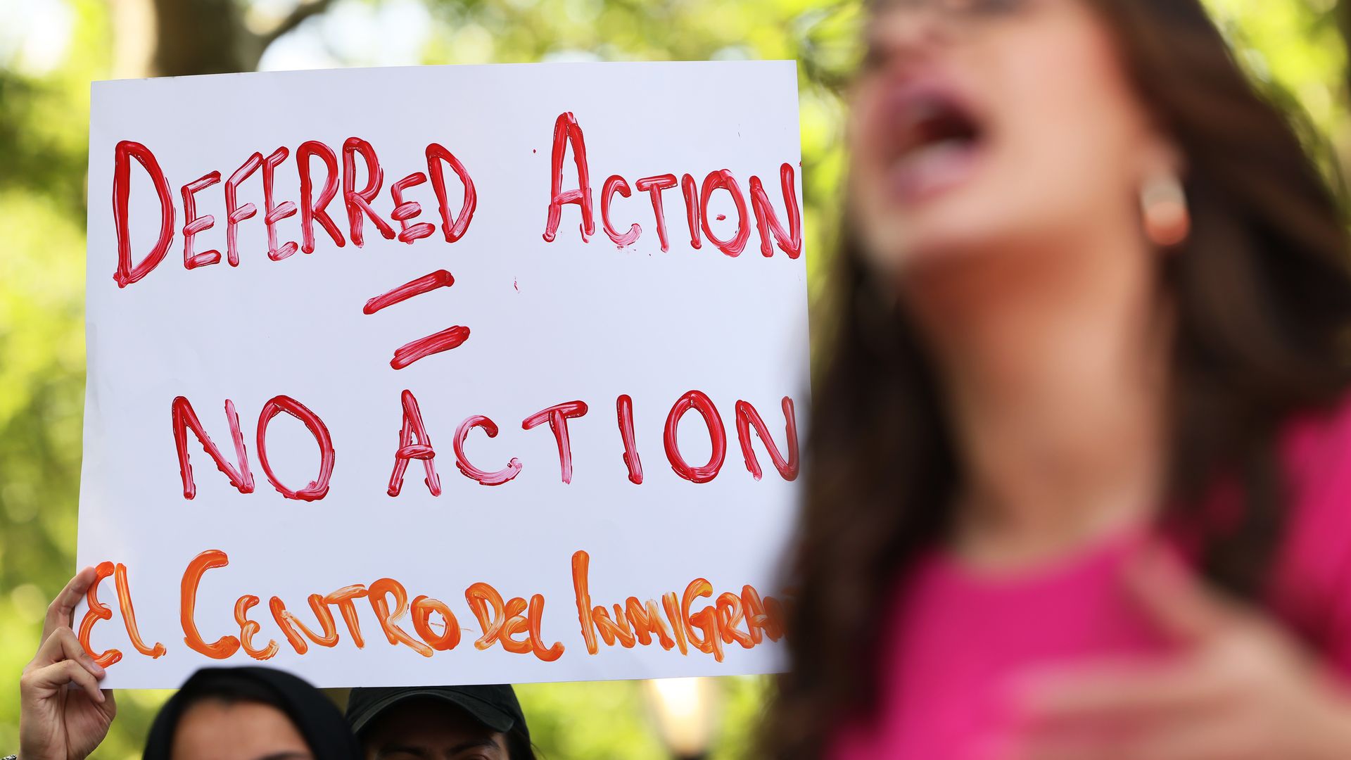 Photo of a sign that says "Deferred Action = NO ACTION"