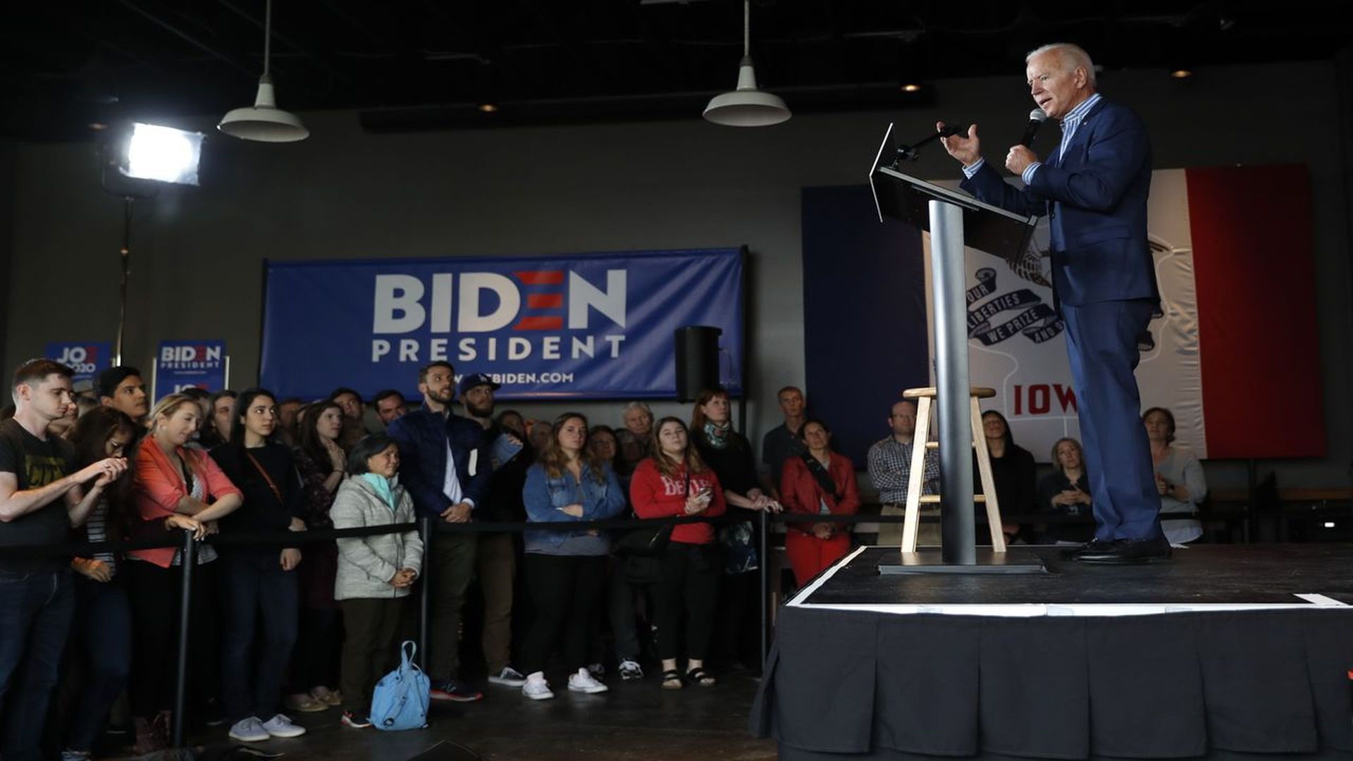 Joe Biden on stage in Iowa