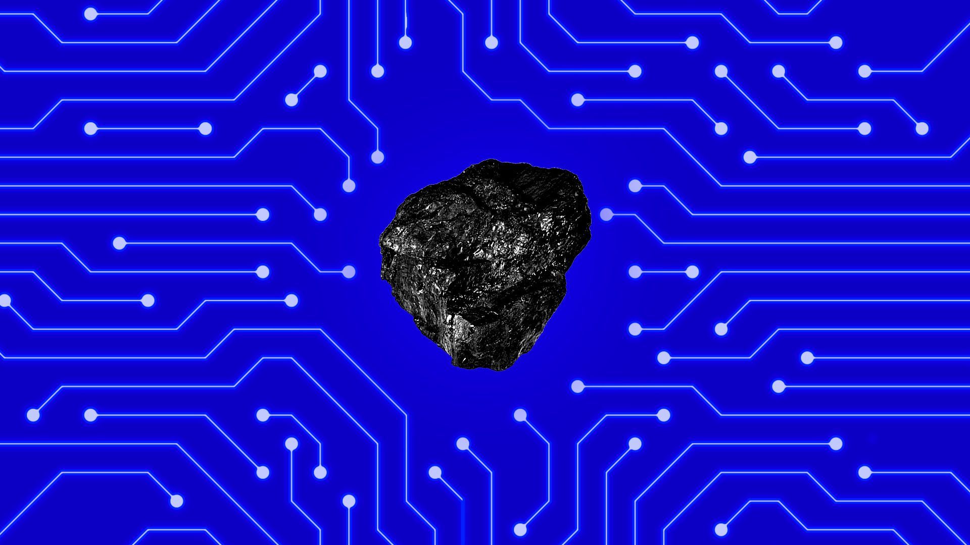 A lump of coal on top of a circuit board