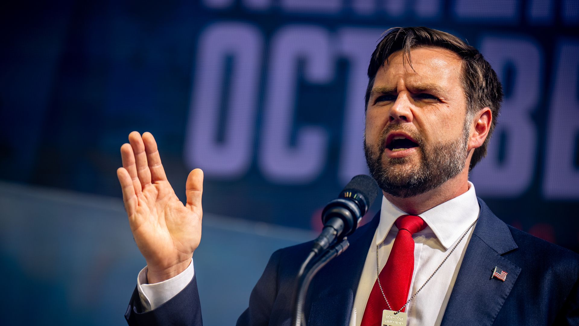 Sen. J.D. Vance (R-OH) wears a necklace that reads "Bring Them Home Now!" as he speaks during a Philos Project October 7th Memorial Rally at the Washington Monument on October 7, 2024 in Washington, DC. The rally is one of many events around the world marking the one-year anniversary since Hamas mou