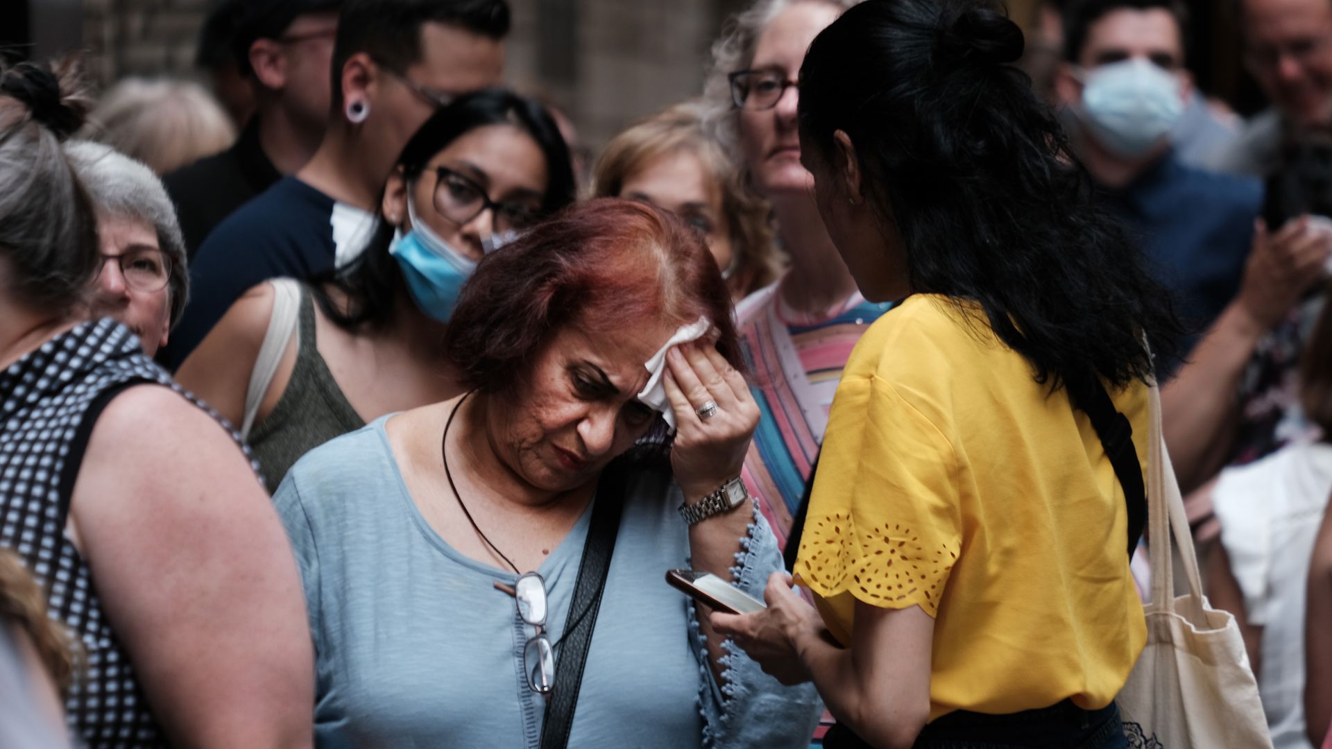 A woman wiping her brow in New York City on July 21.