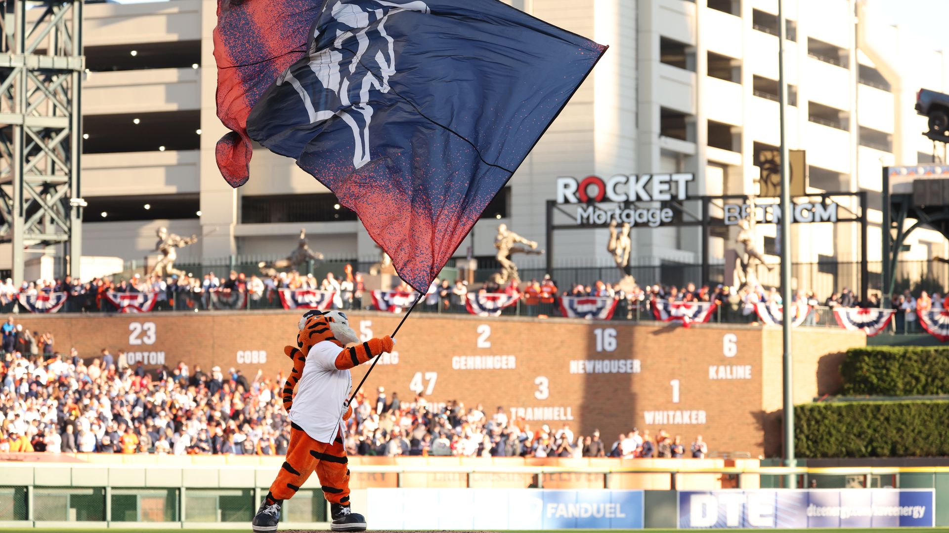 Paws, the Tigers' mascot, celebrates a playoff win against Cleveland last year.