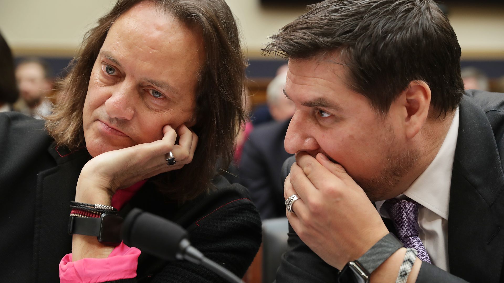 T-Mobile CEO John Legere, left. with Sprint Executive Chairman Marcelo Claure. 