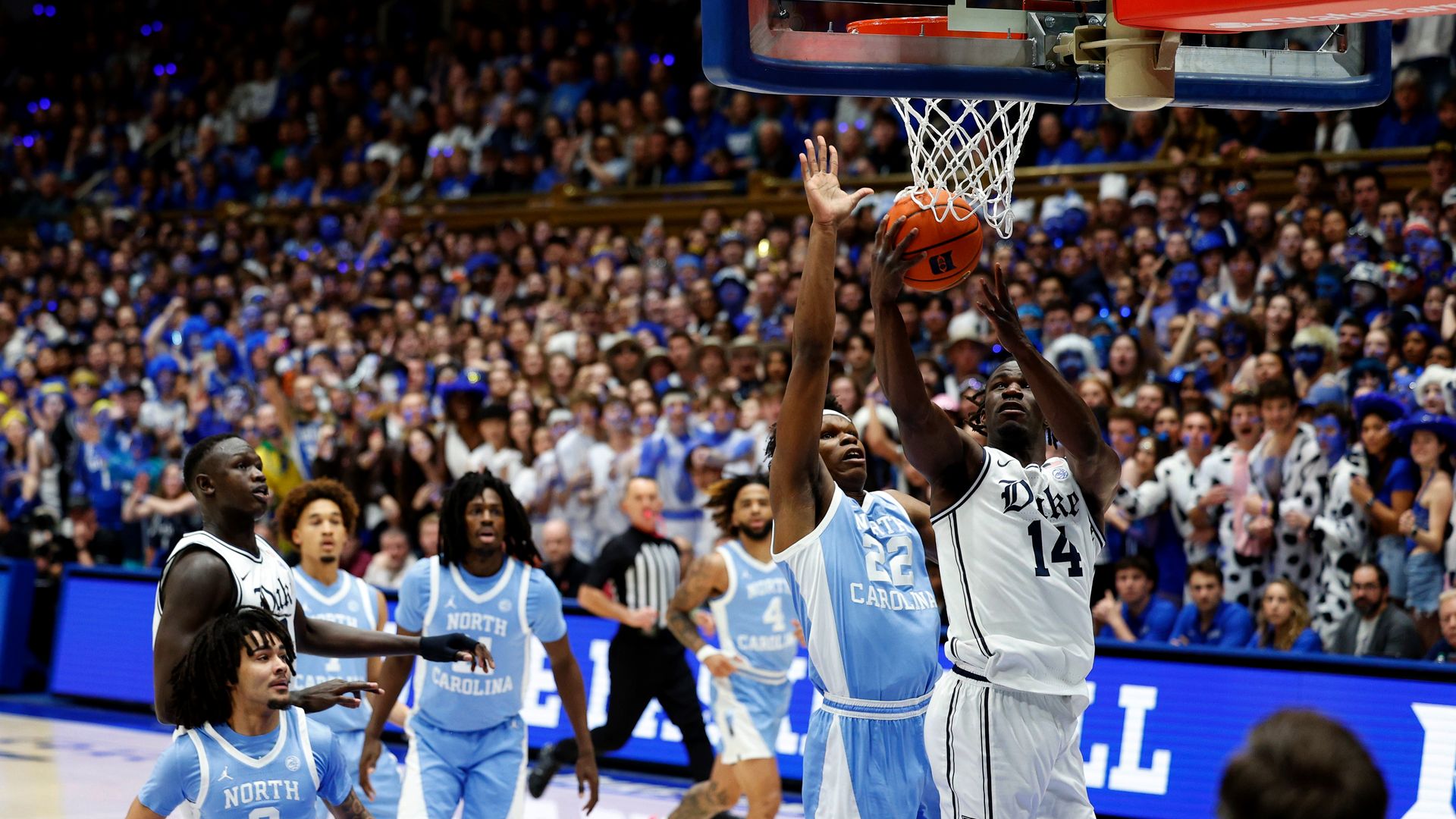 DURHAM, NORTH CAROLINA - FEBRUARY 1: Sion James #14 of the Duke Blue Devils goes to the basket against Ven-Allen Lubin #22 of the North Carolina Tar Heels during the first half at Cameron Indoor Stadium on February 1, 2025 in Durham, North Carolina. (Photo by Lance King/Getty Images)