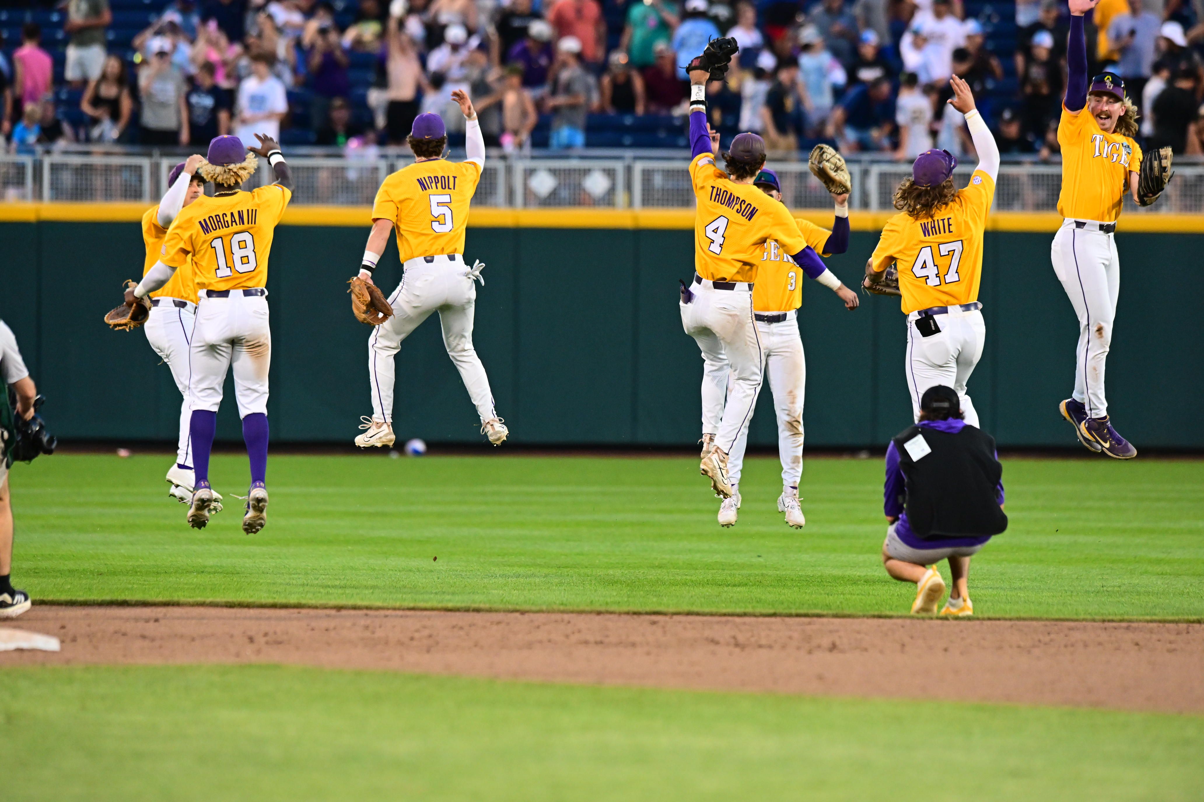 LSU players jump in yellow jerseys after winning a game against Wake Forest