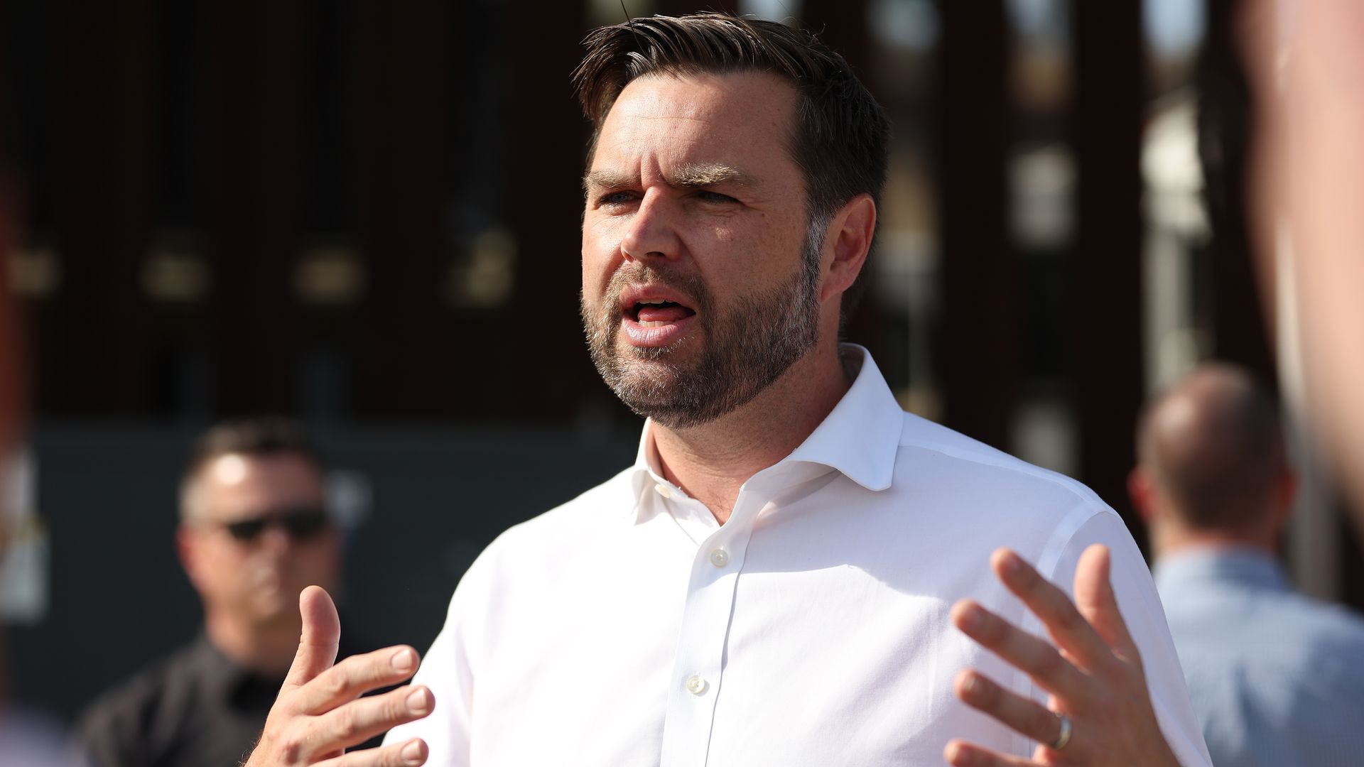 Sen. JD Vance (R-OH) speaks to reporters in front of the border wall with Mexico.