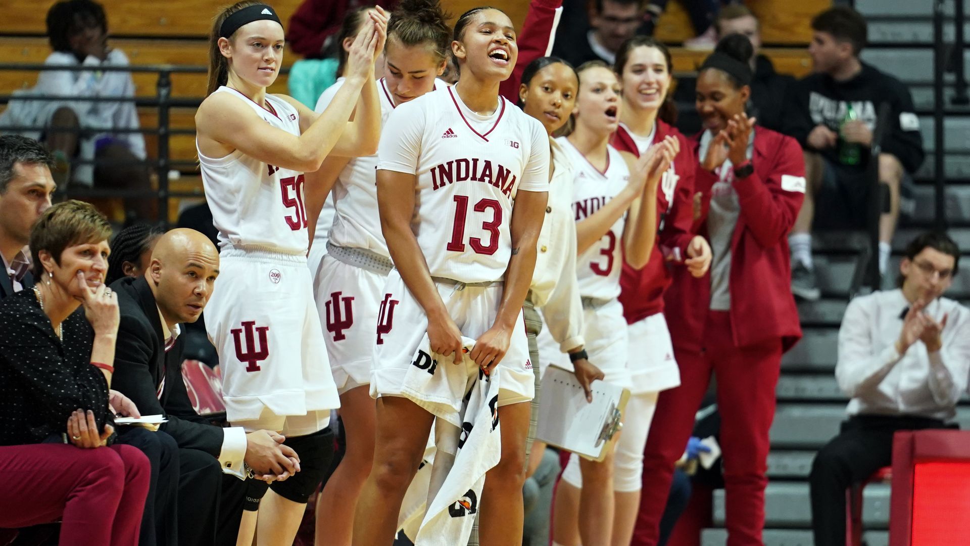 The Indiana Hoosiers celebrate after the NCAA Women's College Basketball game