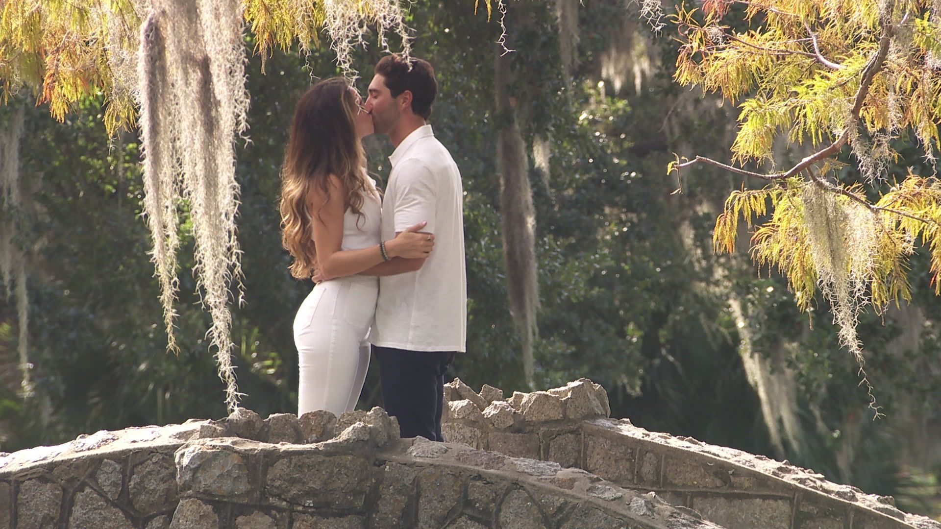 Photo shows Kelsey and Joey kissing in New Orleans City Park