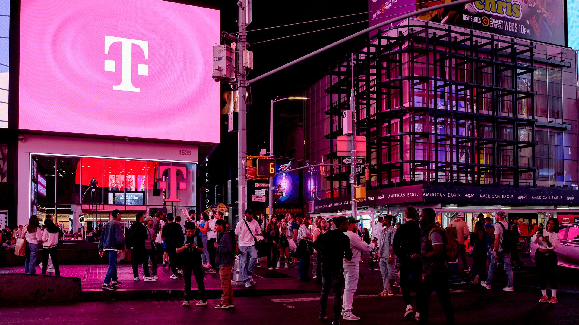 A T-Mobile store in New York City on Oct. 21, 2024. People are crossing the street in front of it