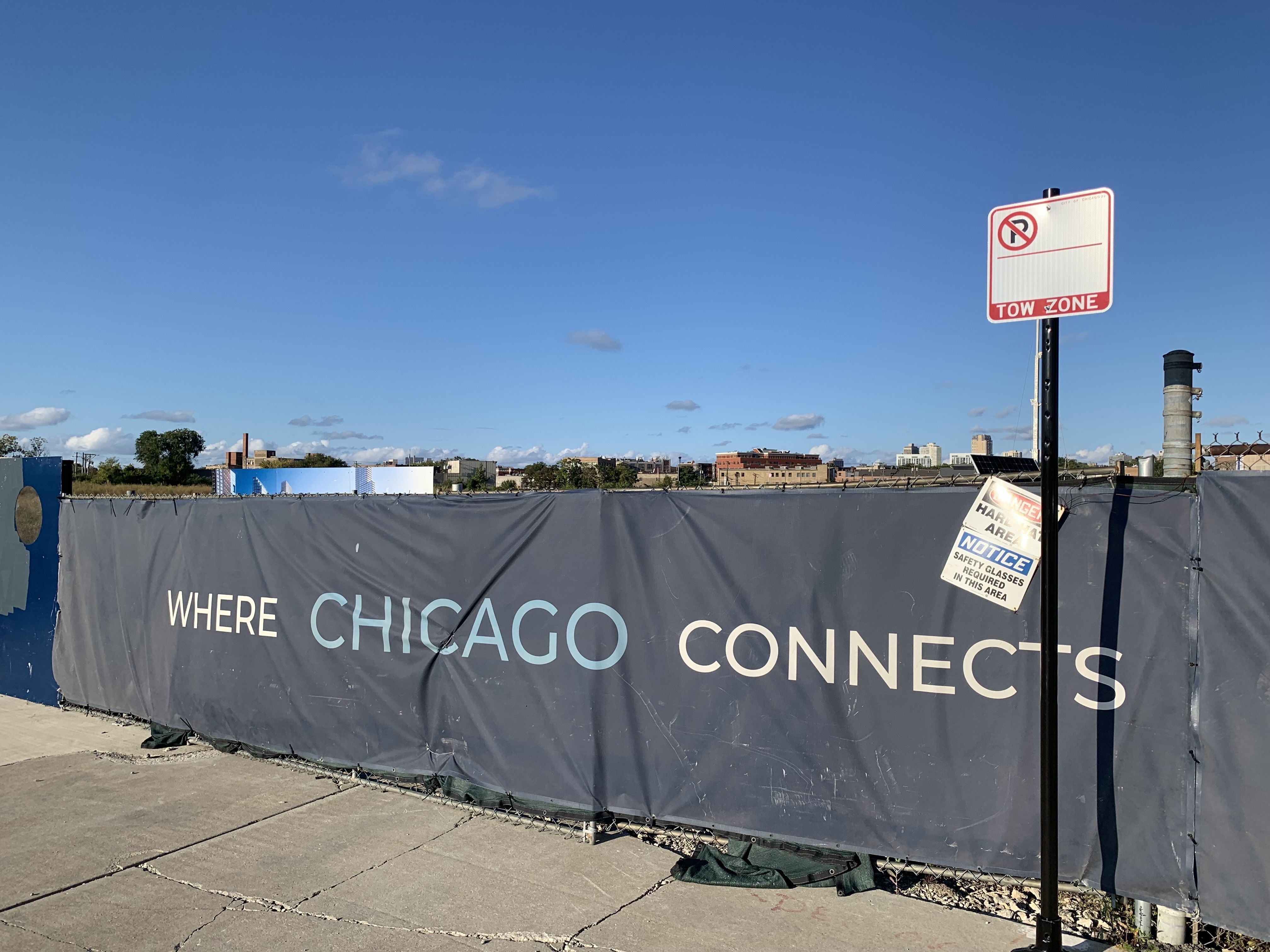 Photo of a fence that says "Where Chicago Connects" 