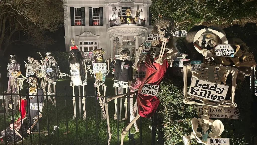 Photo shows skeletons decorating a front yard in New Orleans