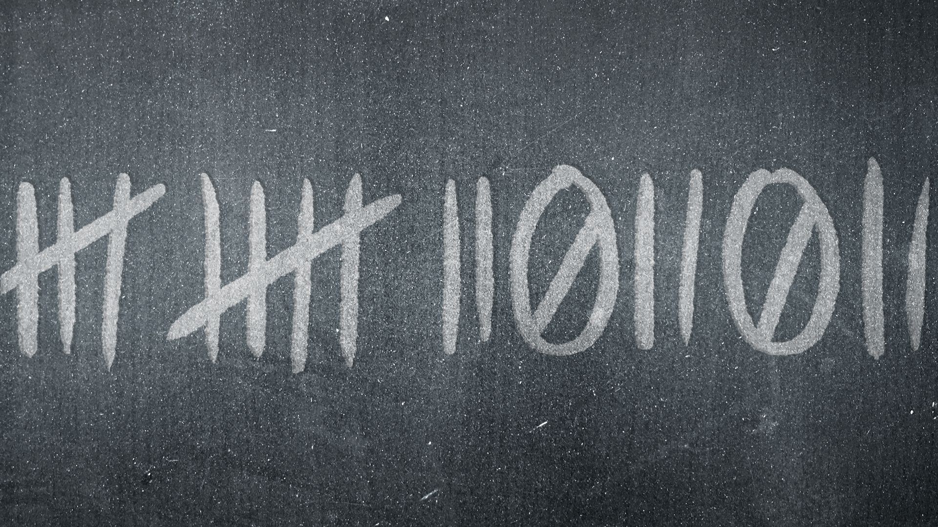 Illustration of tick marks, ones and zeroes carved into a wall.