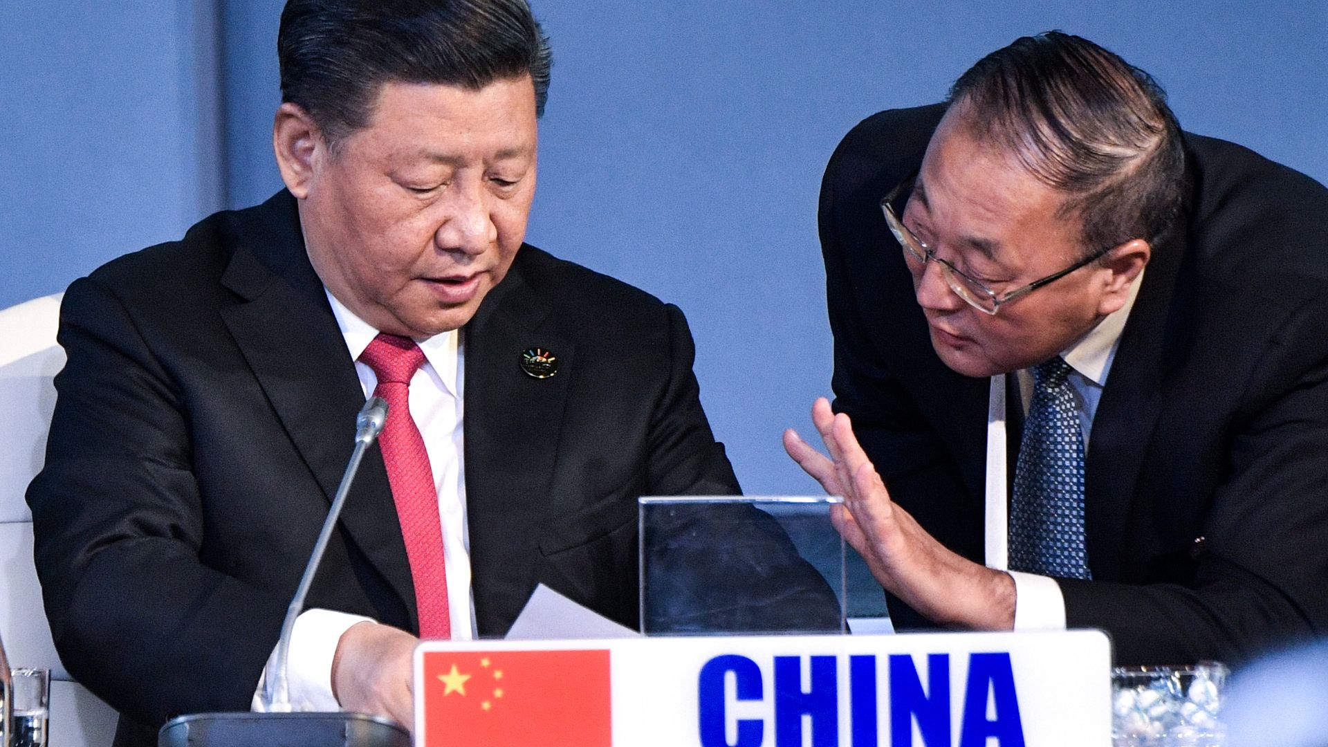Chinese President Xi Jinping sitting at a summit. 