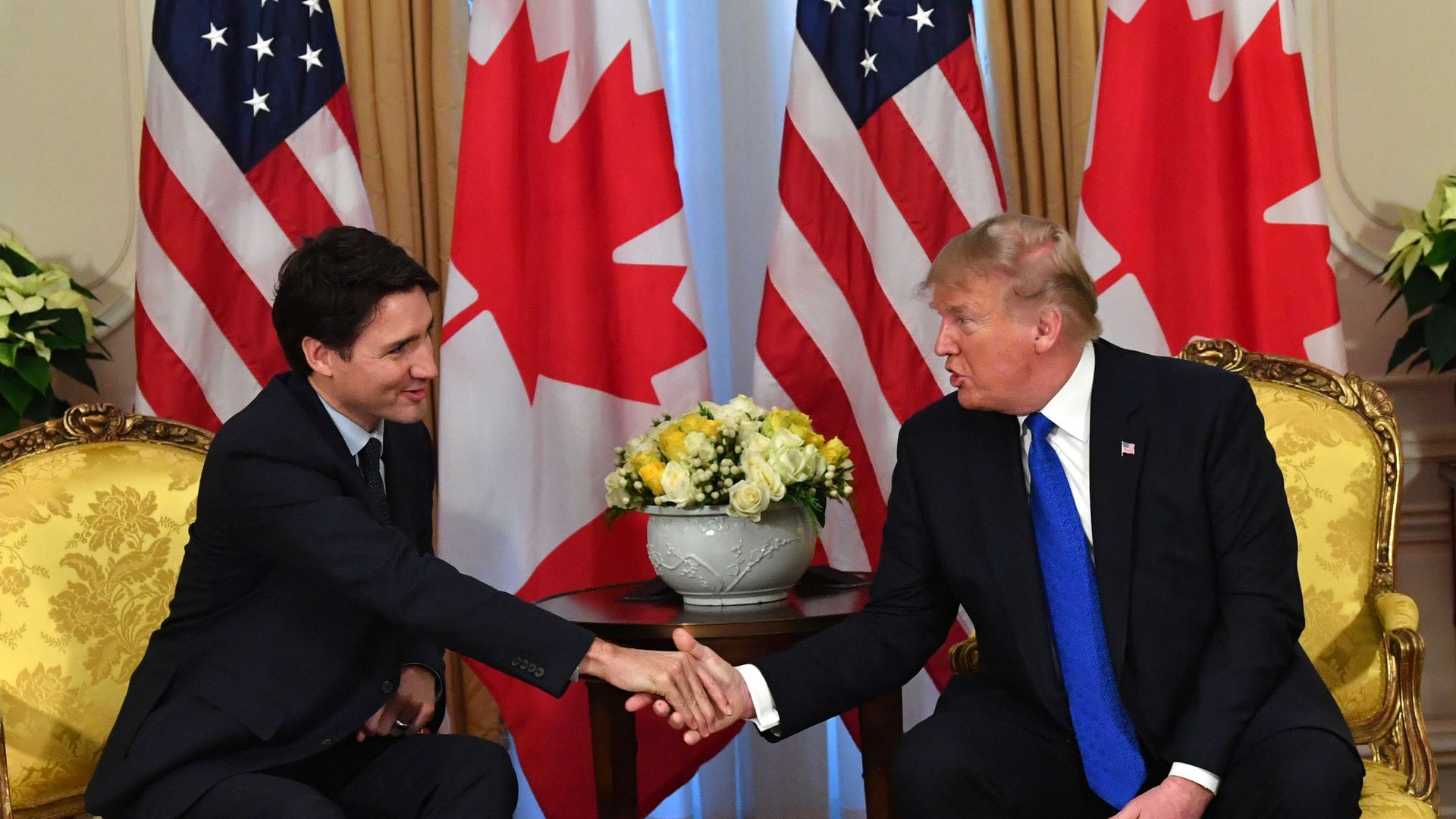 President Trump and Canadian Prime Minister Trudeau shake hands in London in 2019.