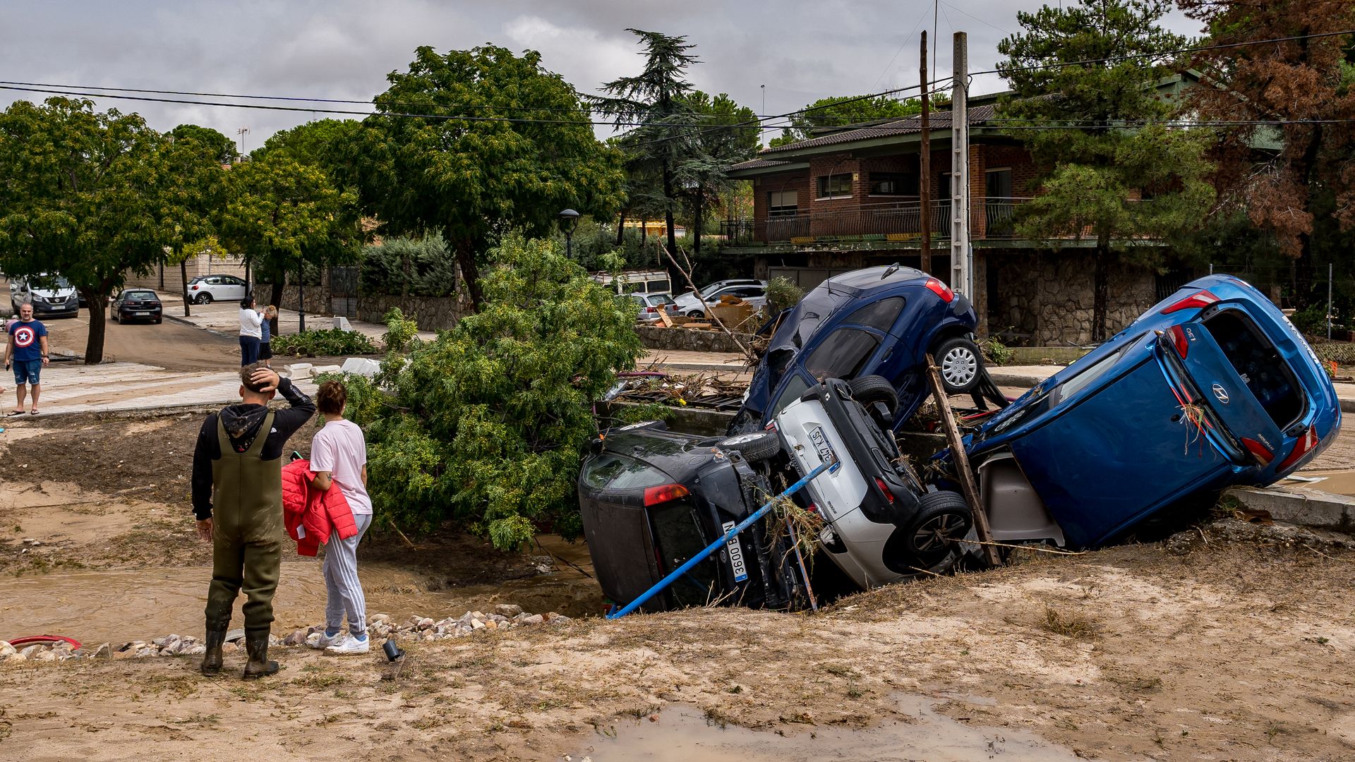 Photo of overturned, damaged cars during the floods in Spain during early Sept. 2023