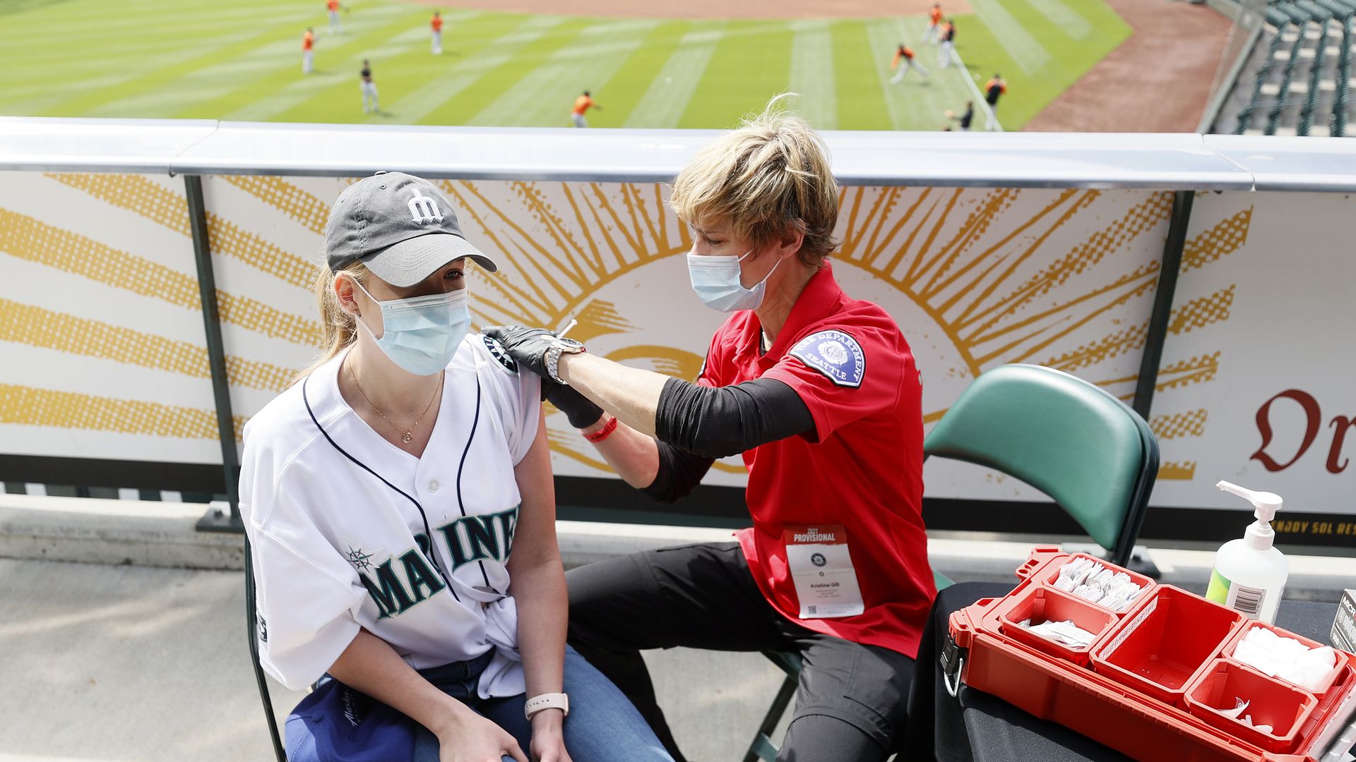Mariners fan getting vaccinated for COVID-19