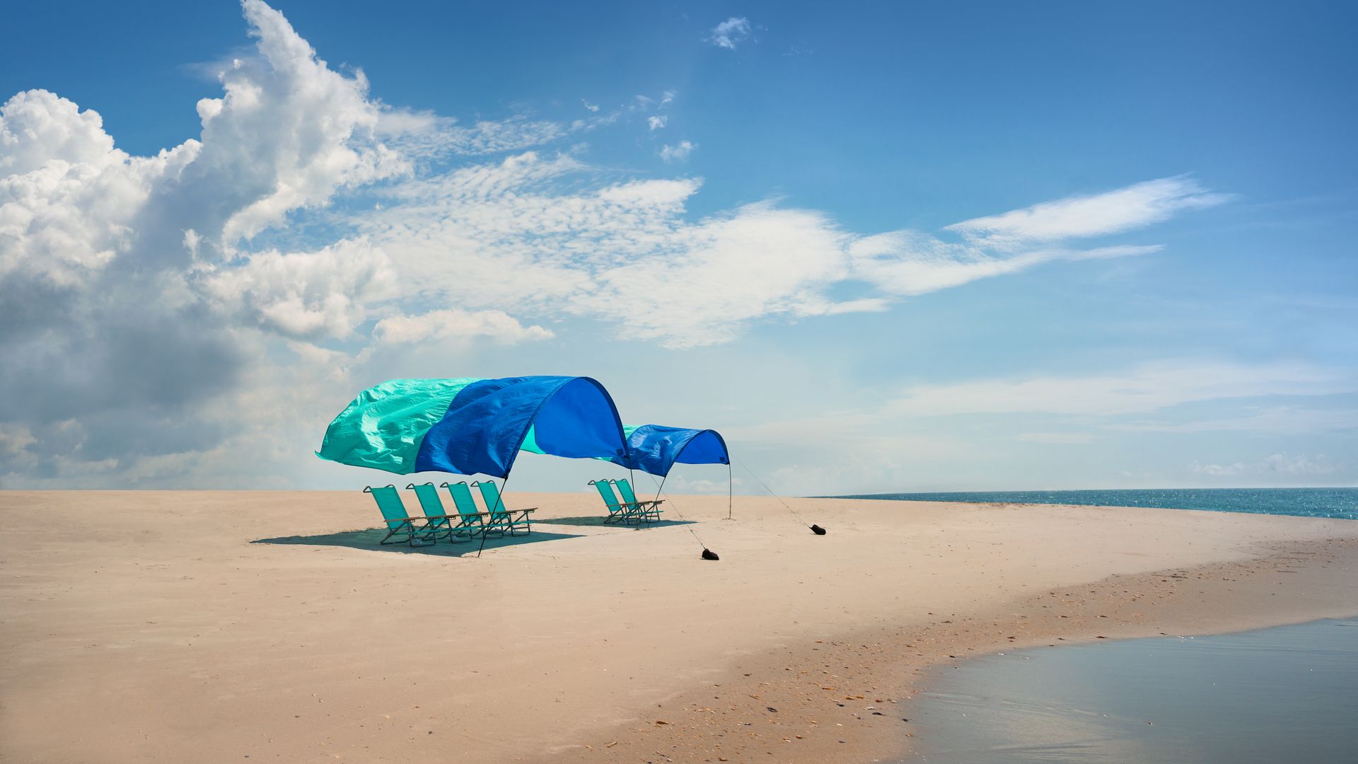 A wind-powered shade on a beach