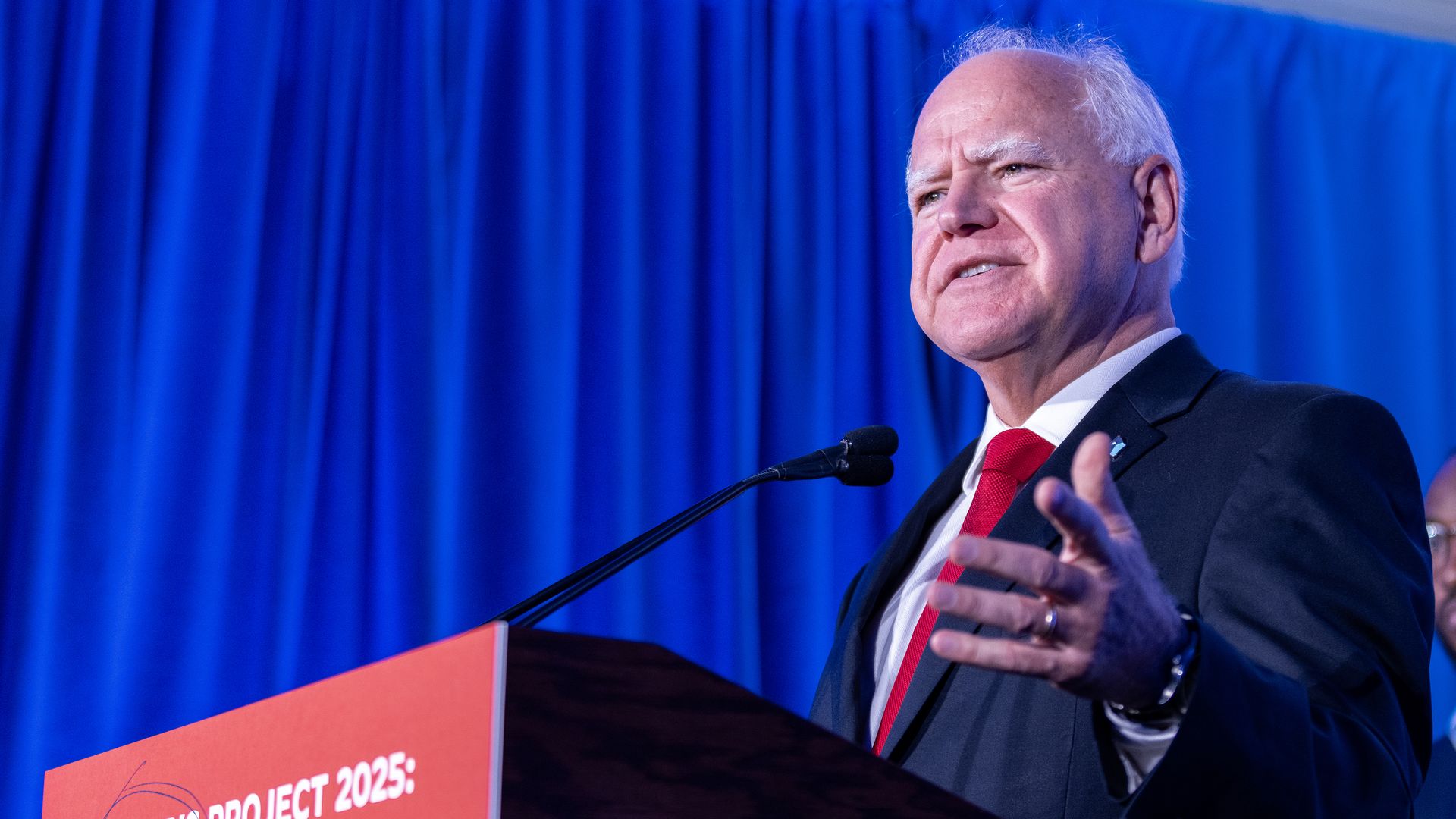 Minnesota Governor Tim Walz speaks at a lectern