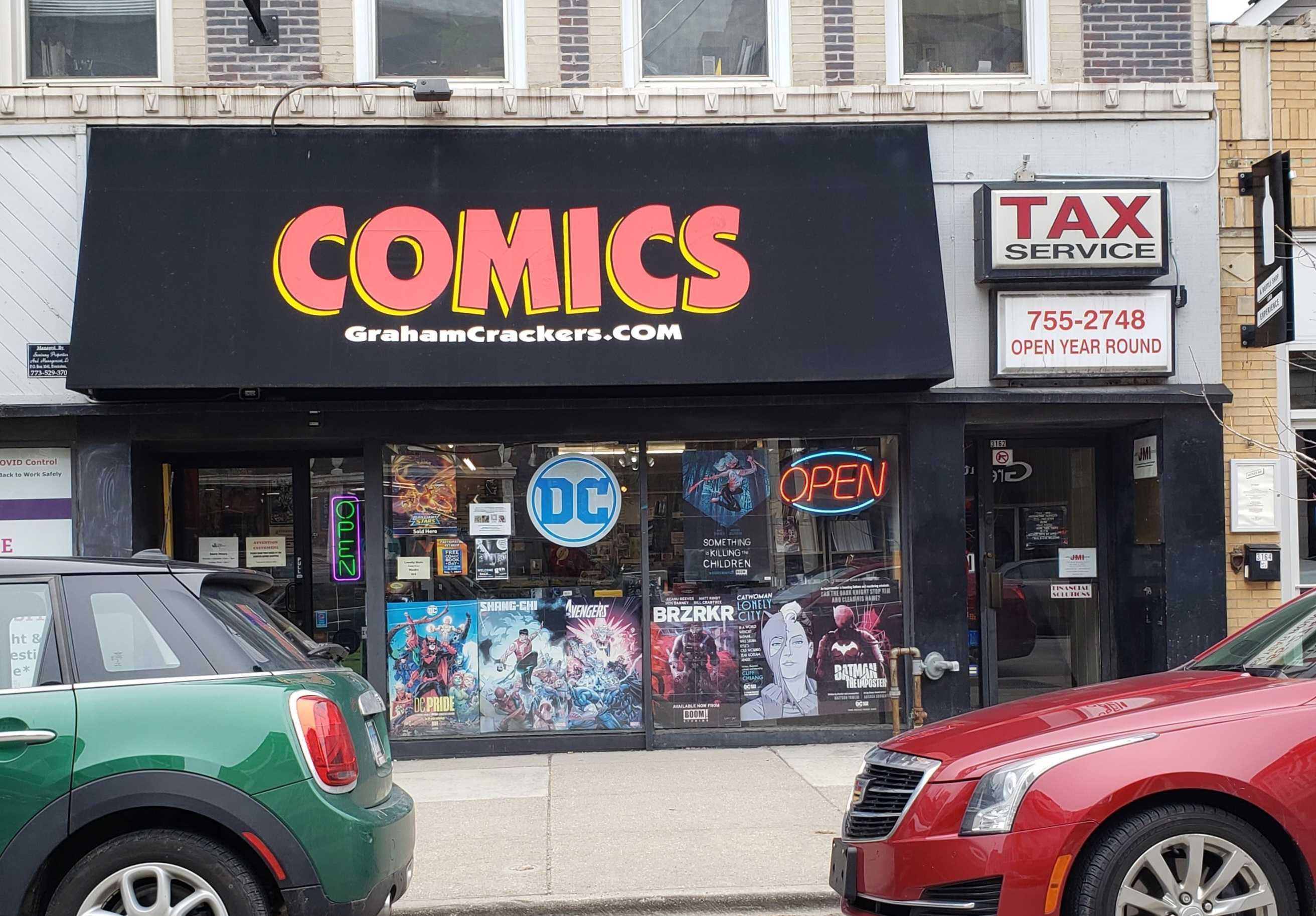 Photo of a comic book store window. 