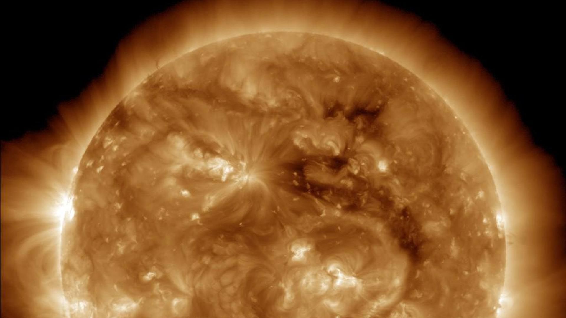 The Sun as seen by the Solar Dynamics Observatory in yellow light.