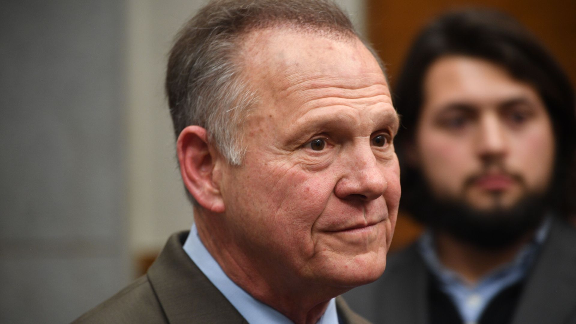 Roy Moore looking to the side. 