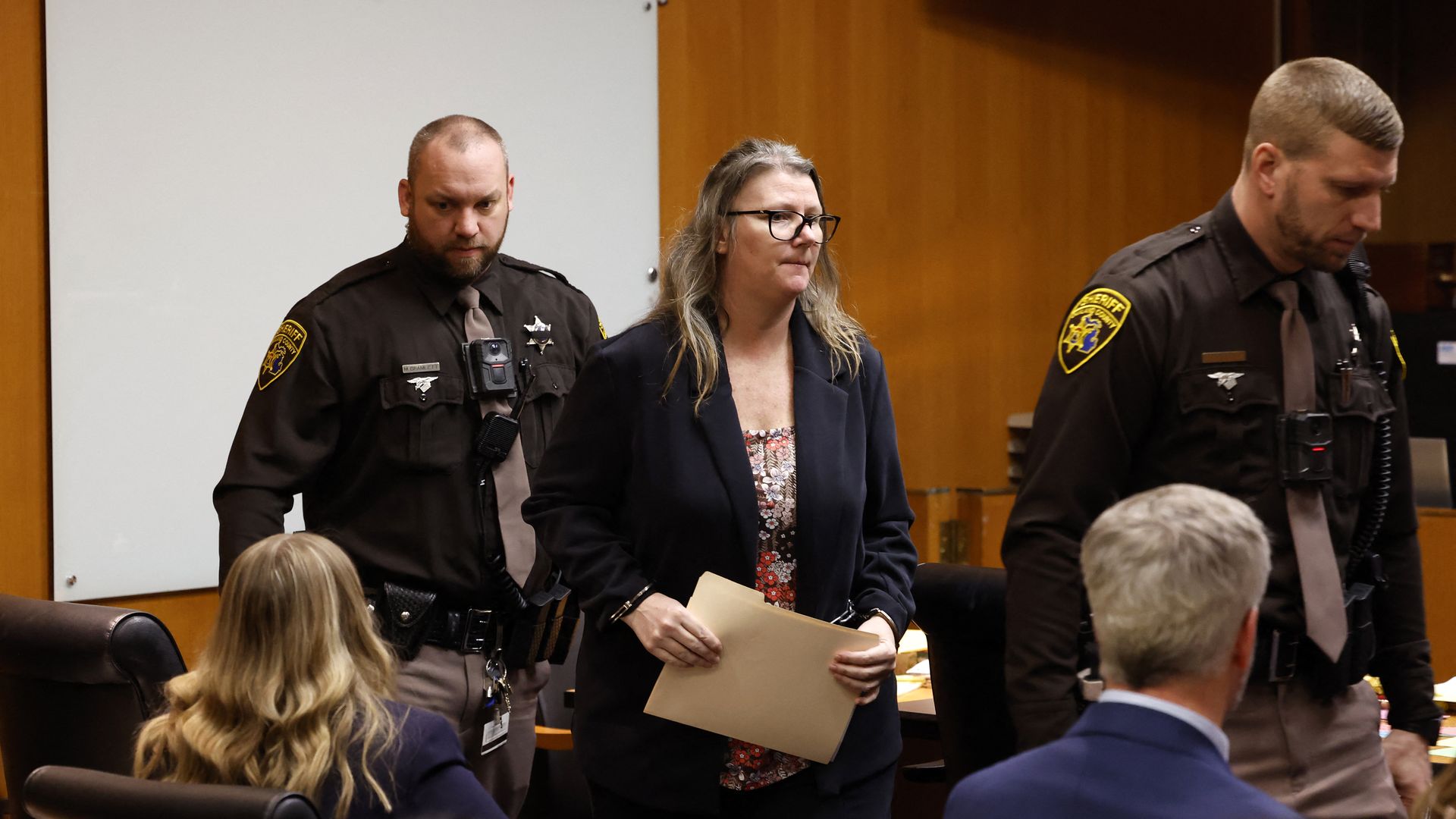 Jennifer Crumbley, 43, the mother of accused Oxford High School gunman Ethan Crumbley exits the courtroom of Oakland County Court in Pontiac, Michigan during a break in her trial 