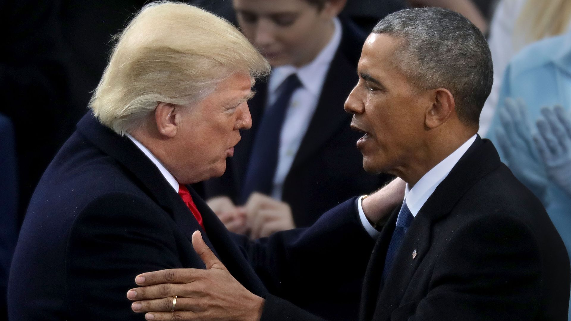 File photo of Trump and Obama shaking hands. 