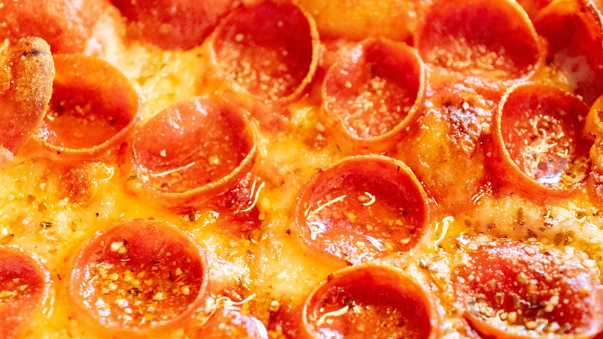 Up-close shot of a pepperoni pizza