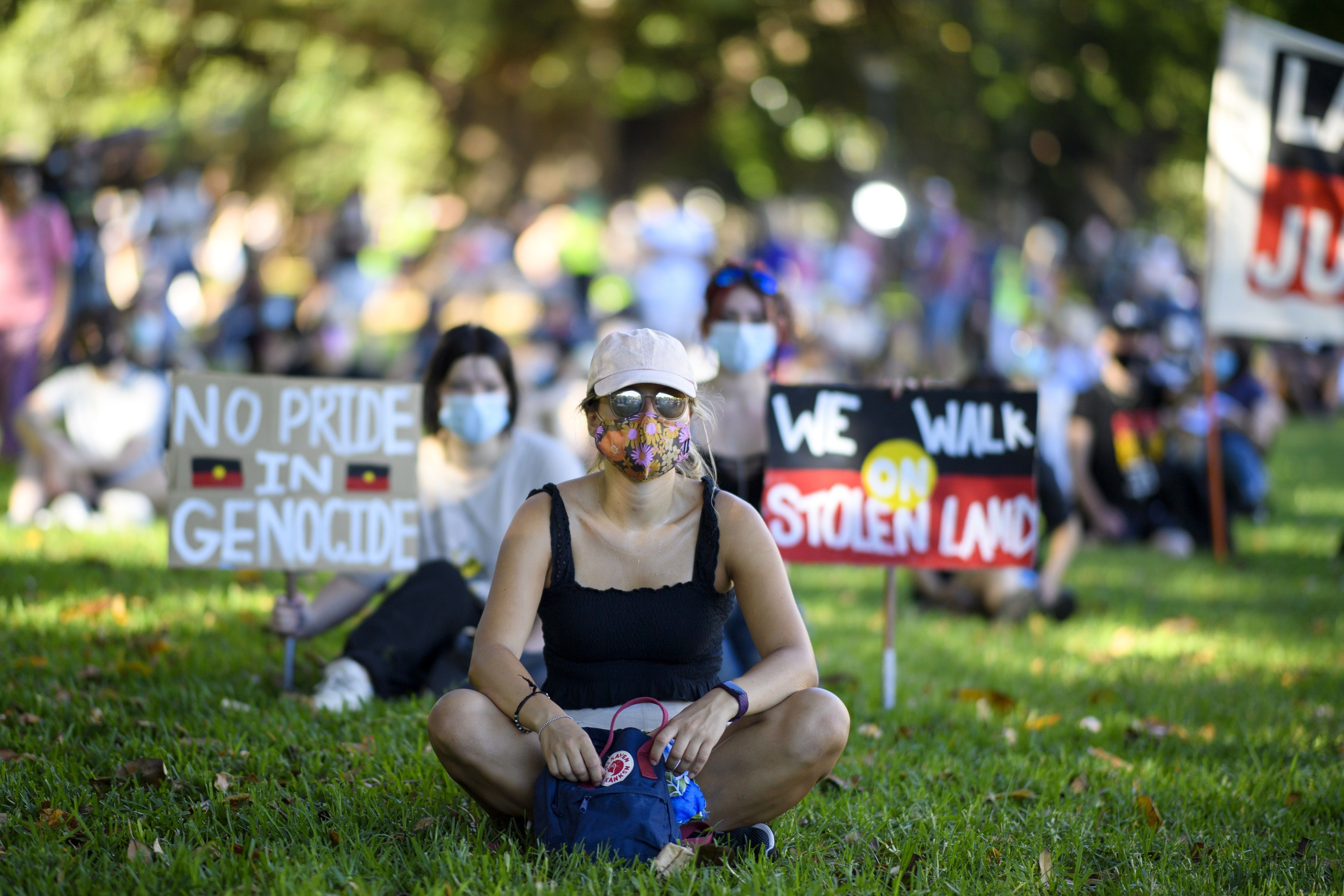 Protesters gather at The Domain during an "Invasion Day" demonstration on Australia Day in Sydney on January 26