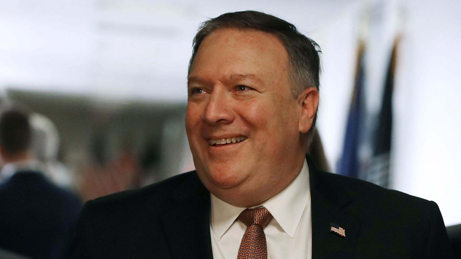 Pompeo smiles