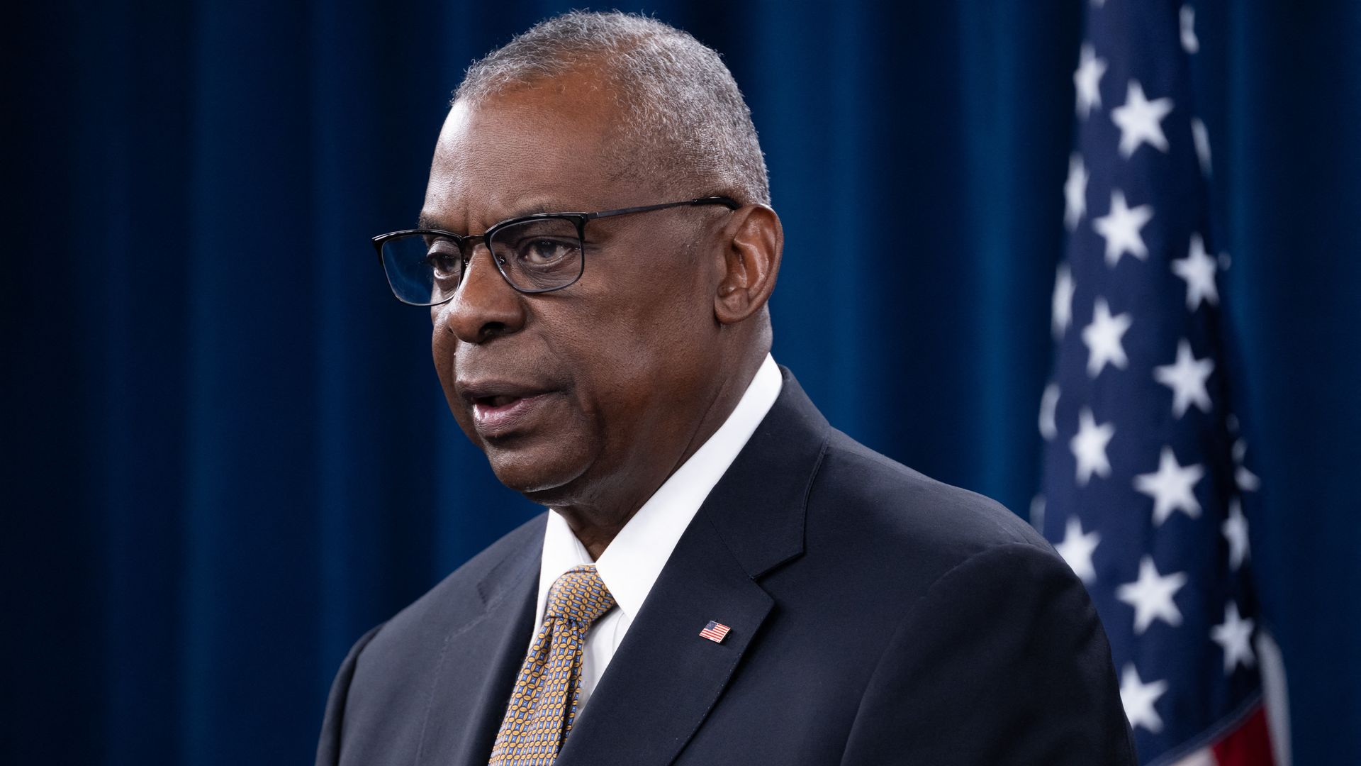 Defense Secretary Lloyd Austin speaking in the Pentagon on April 26.
