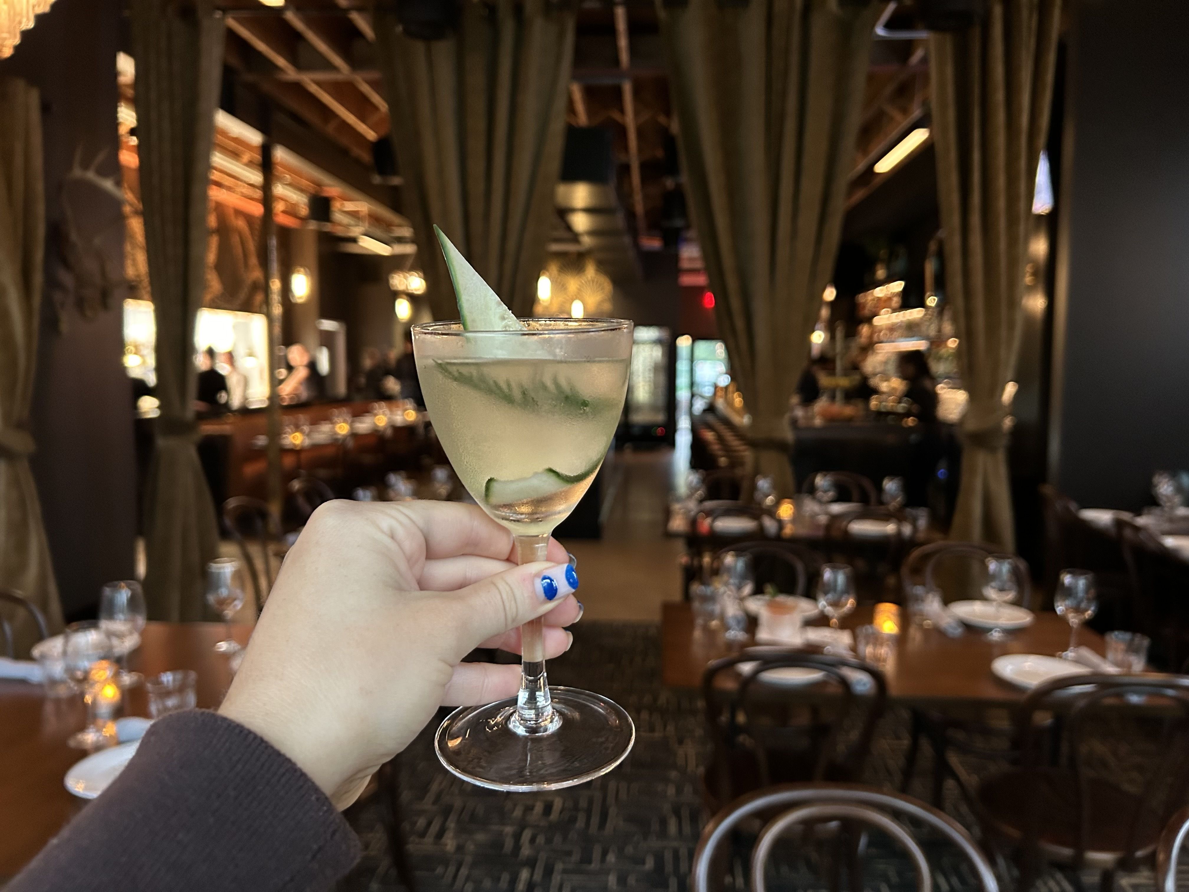 hand holding cocktail