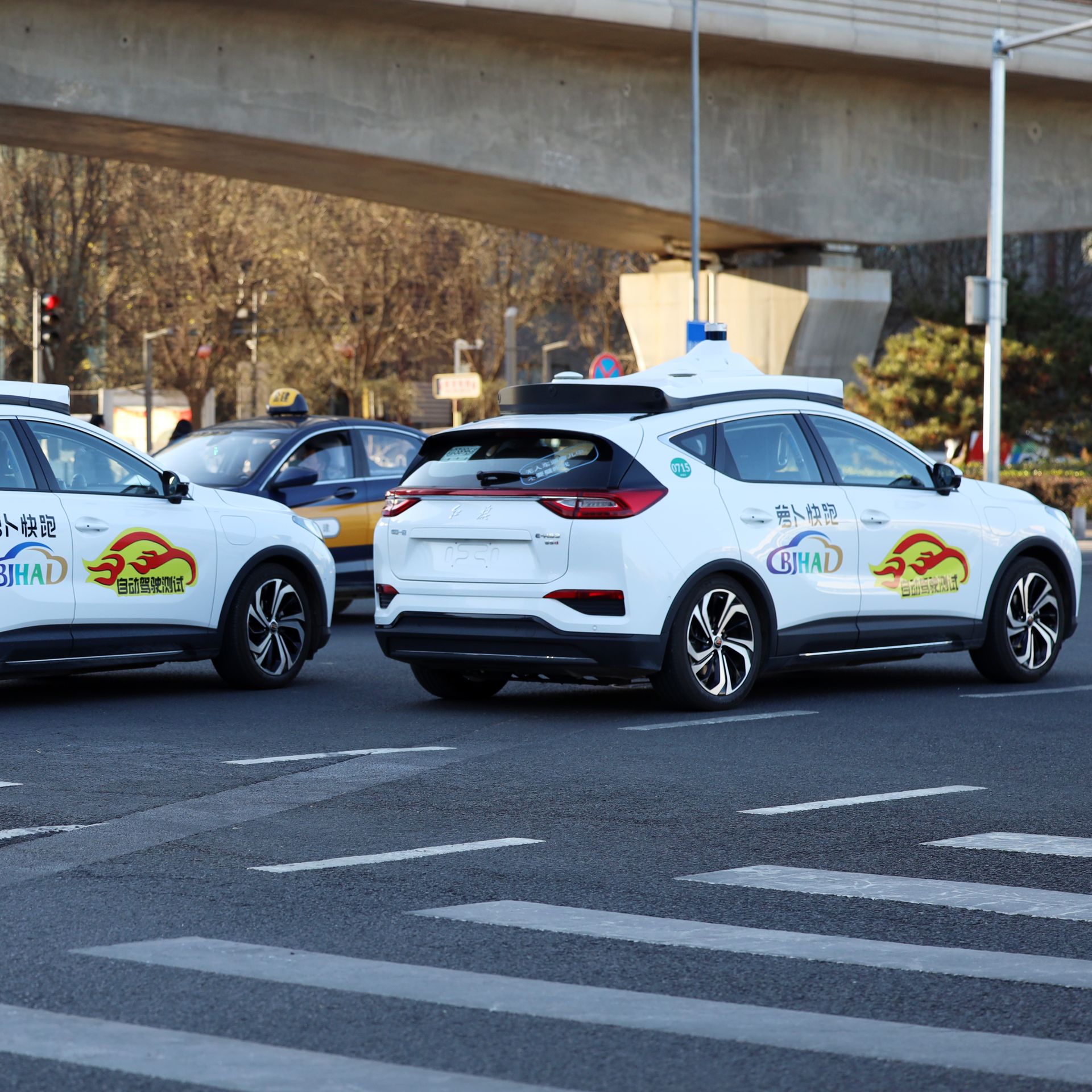 two driverless cars from Baidu shown on roads of Beijing