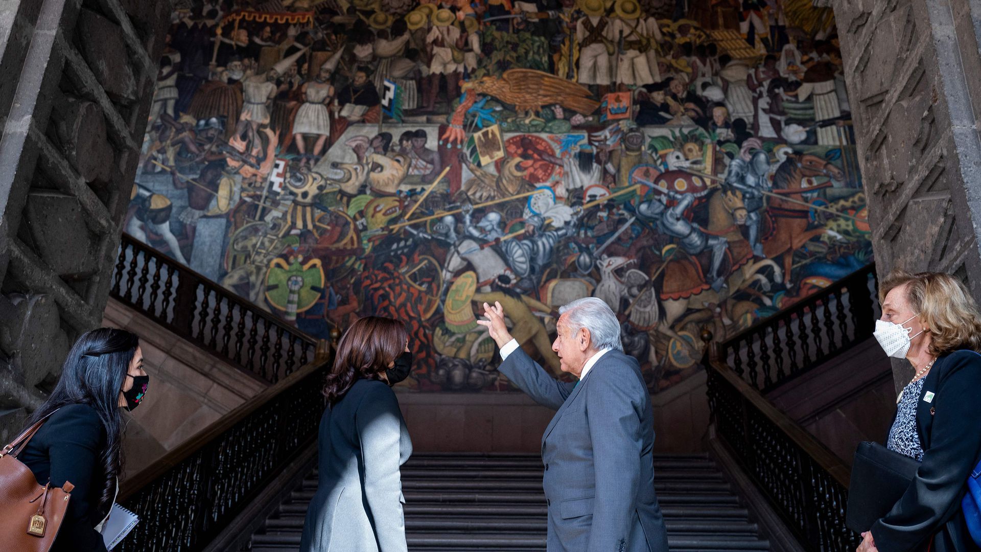 U.S. Vice President Kamala Harris and Mexican President Andrés Manuel López Obrador, with interpreters, before a Rivera mural in Mexico’s National Palace on June 8.