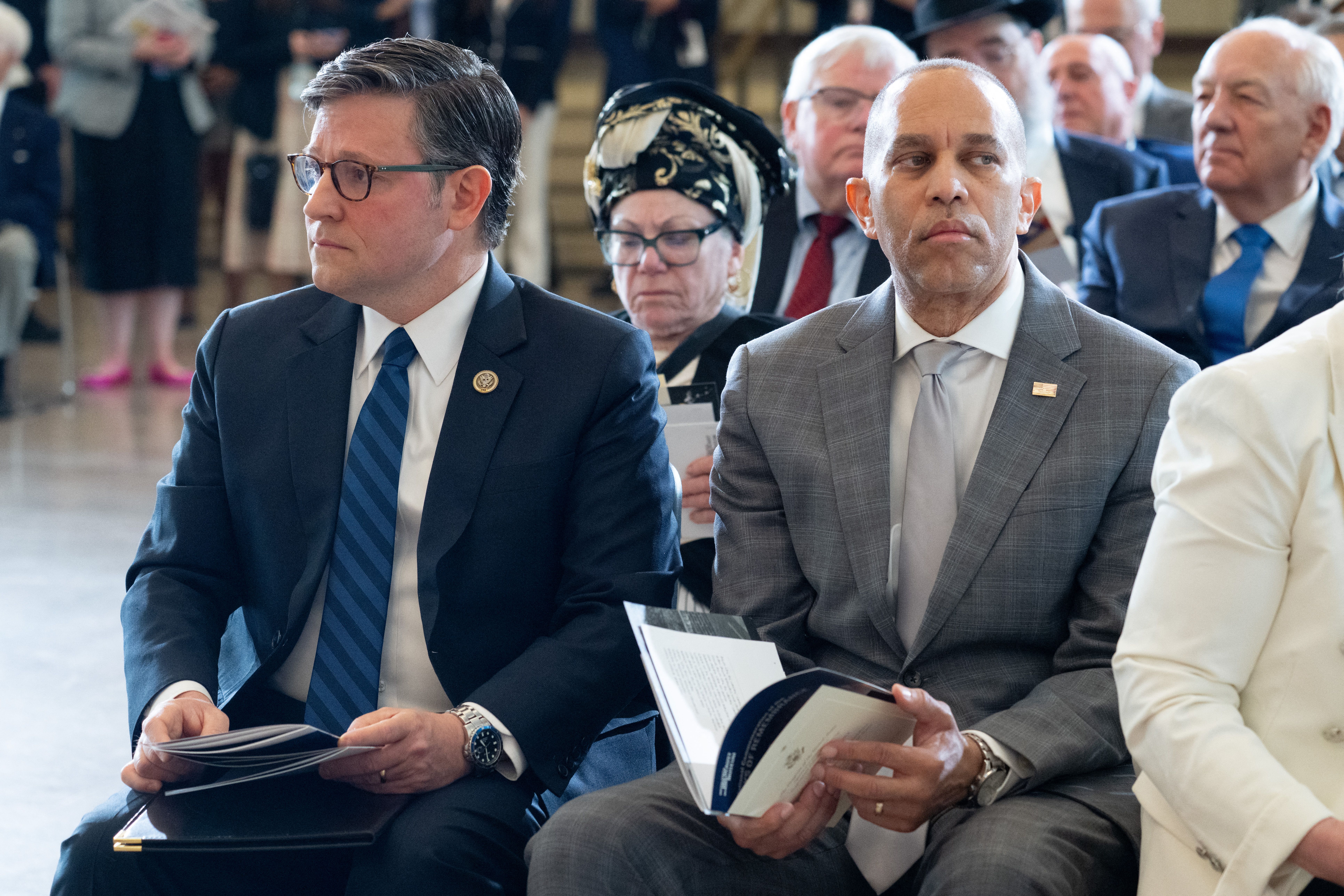 House Speaker Mike Johnson and Minority Leader Hakeem Jeffries attend the Holocaust Memorial Museum's National Commemoration of the Days of Remembrance ceremony at the U.S. Capitol on April 14. 