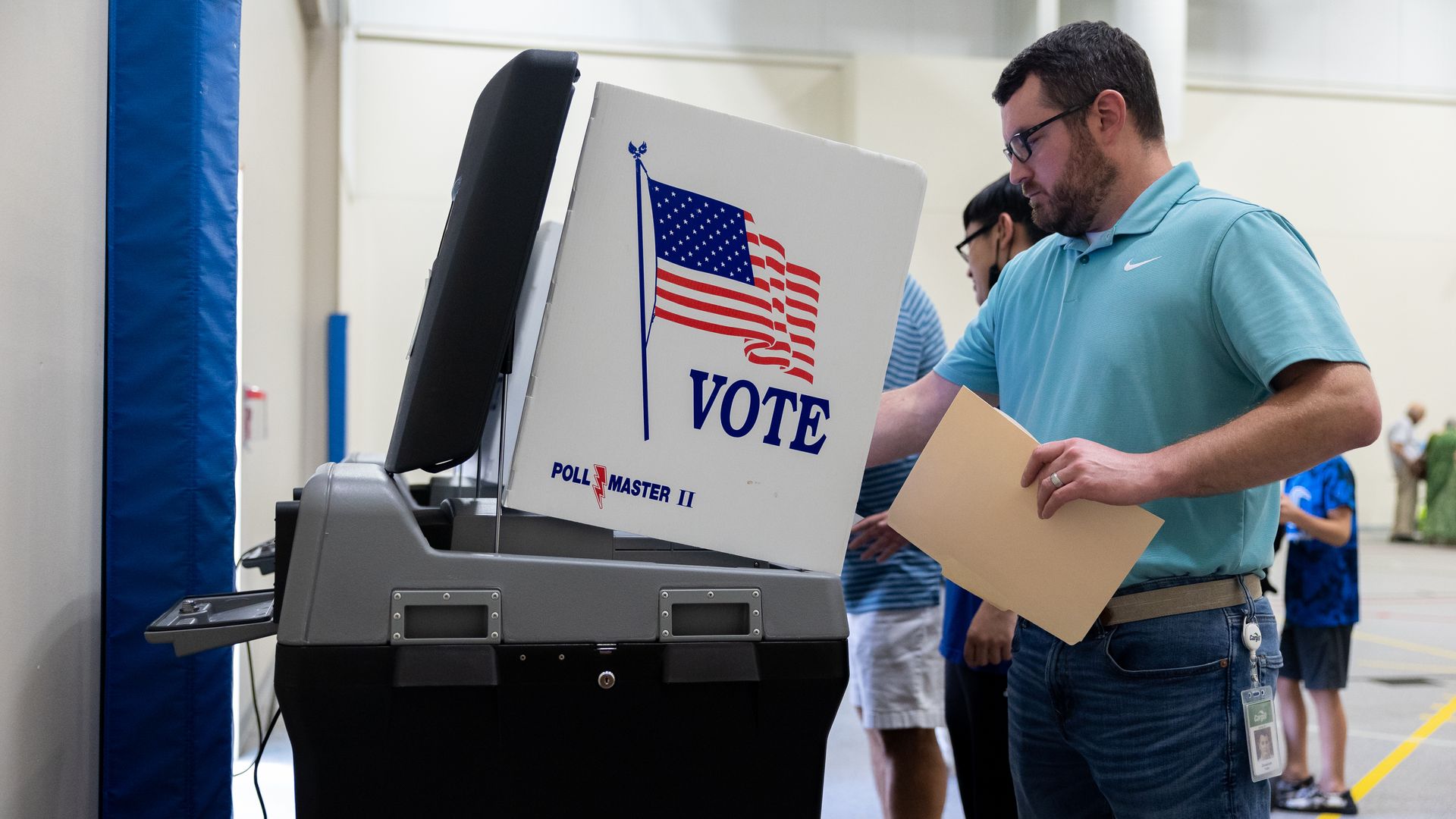 Voters cast their ballots at the West Evangelical Free church in Wichita, Kansas.