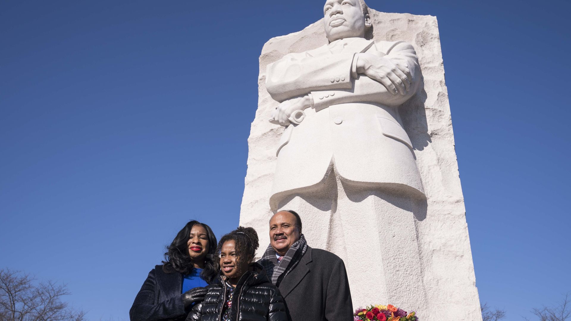 Martin Luther King III, Arndrea King and their daughter, Yolanda Renee King, are seen at the federal memorial to MLK Jr.