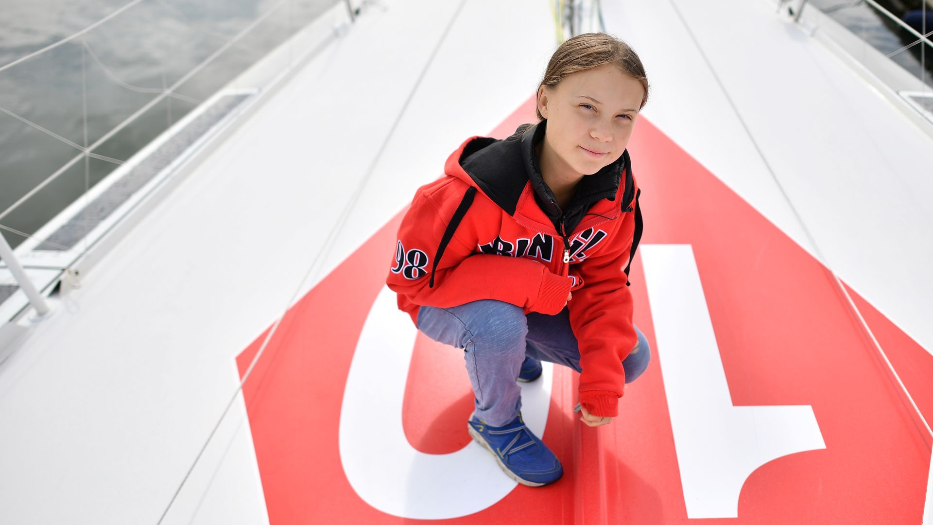 Swedish climate activist Greta Thunberg poses for a photograph during an inteview with AFP onboard the Malizia II sailing yacht at the Mayflower Marina in Plymouth, southwest England, on August 13