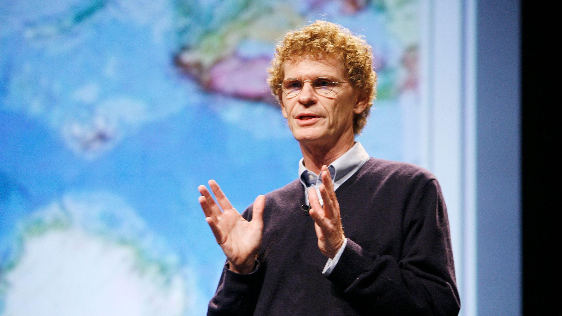 Dr. Cary Fowler is seen speaking.