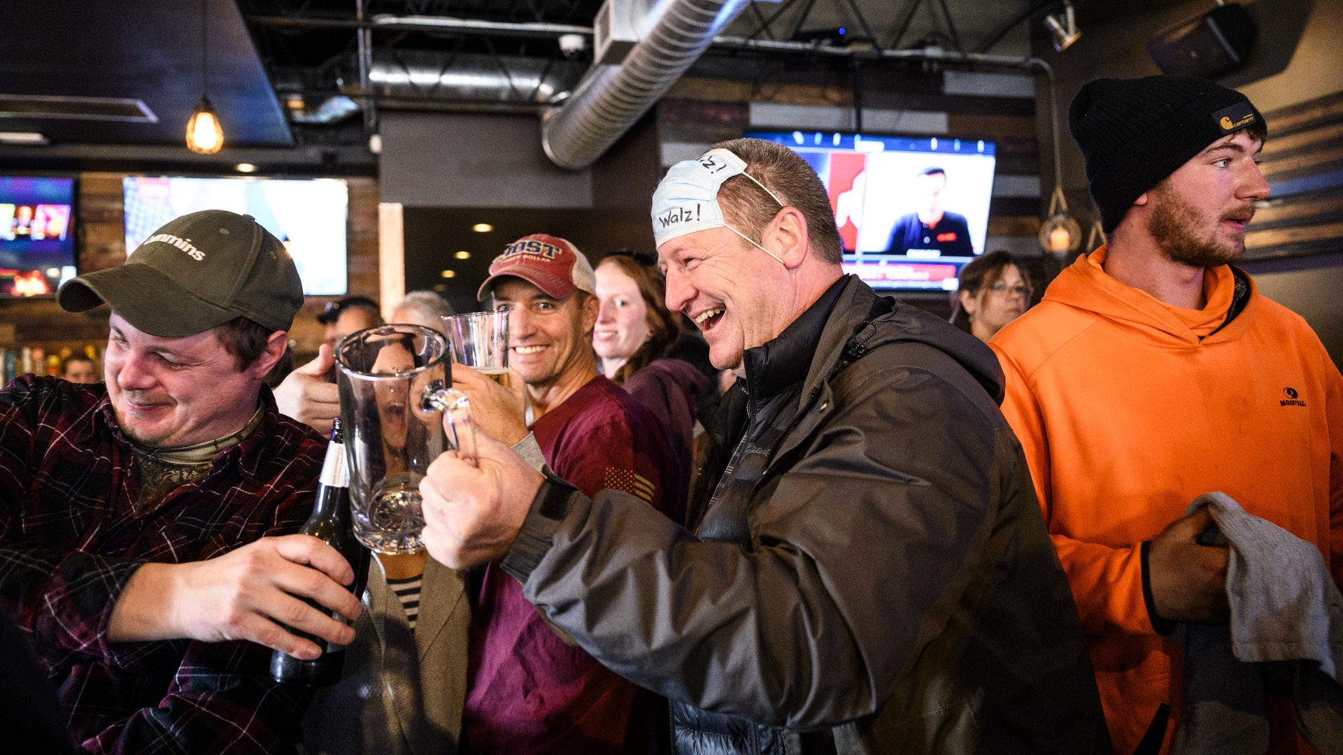 Patrons at Alibi Drinkery celebrate at the Lakeville bar in December 