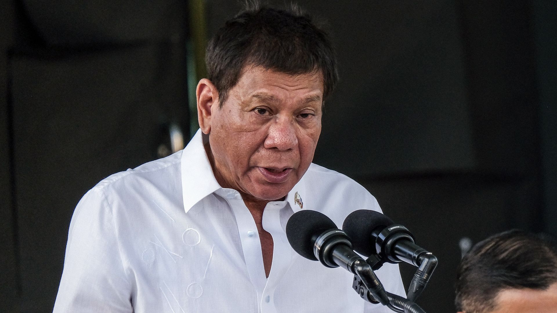 Philippines' president Rodrigo Duterte center, during the arrival ceremony of the first shipment of Sinovac Biotech Ltd. coronavirus vaccine in Pasay City, Manila, the Philippines, on Feb. 28.