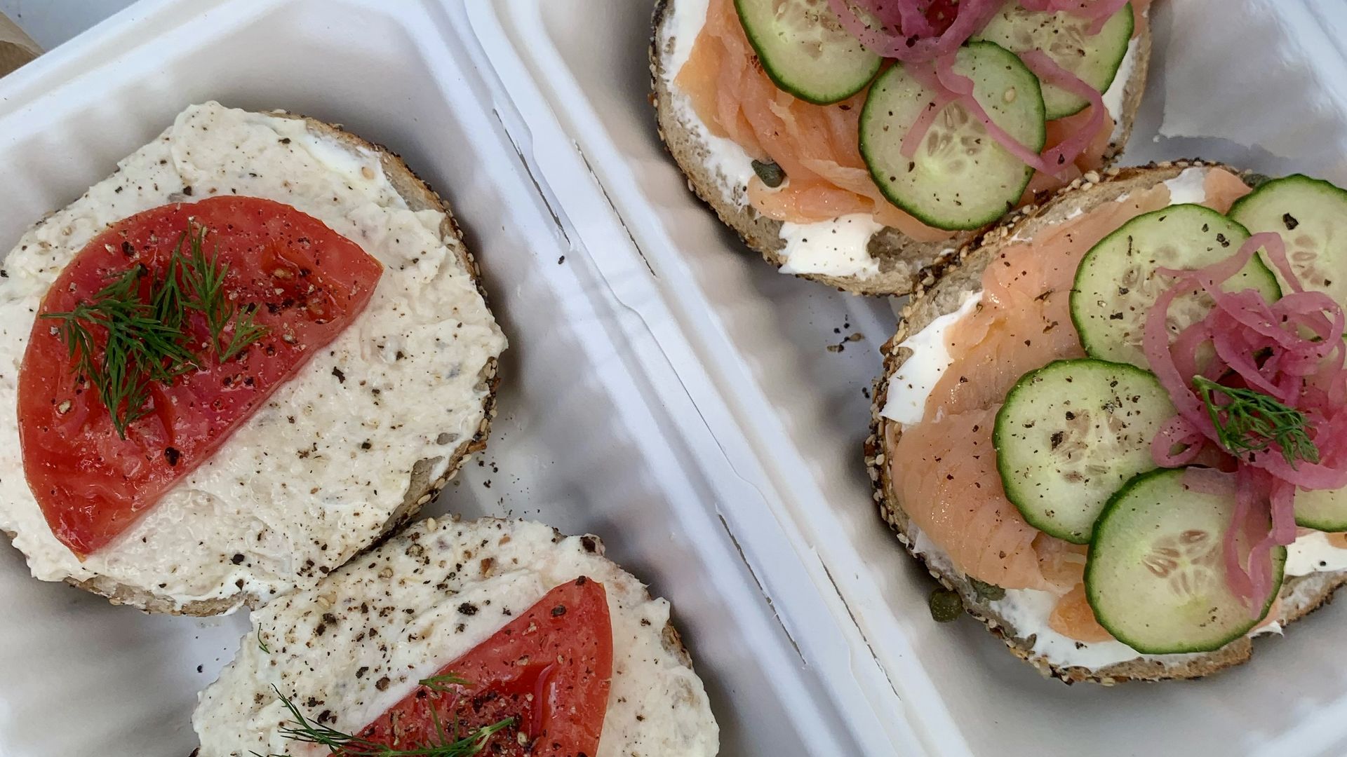 Two bagels, one with whitefish and one with Lox