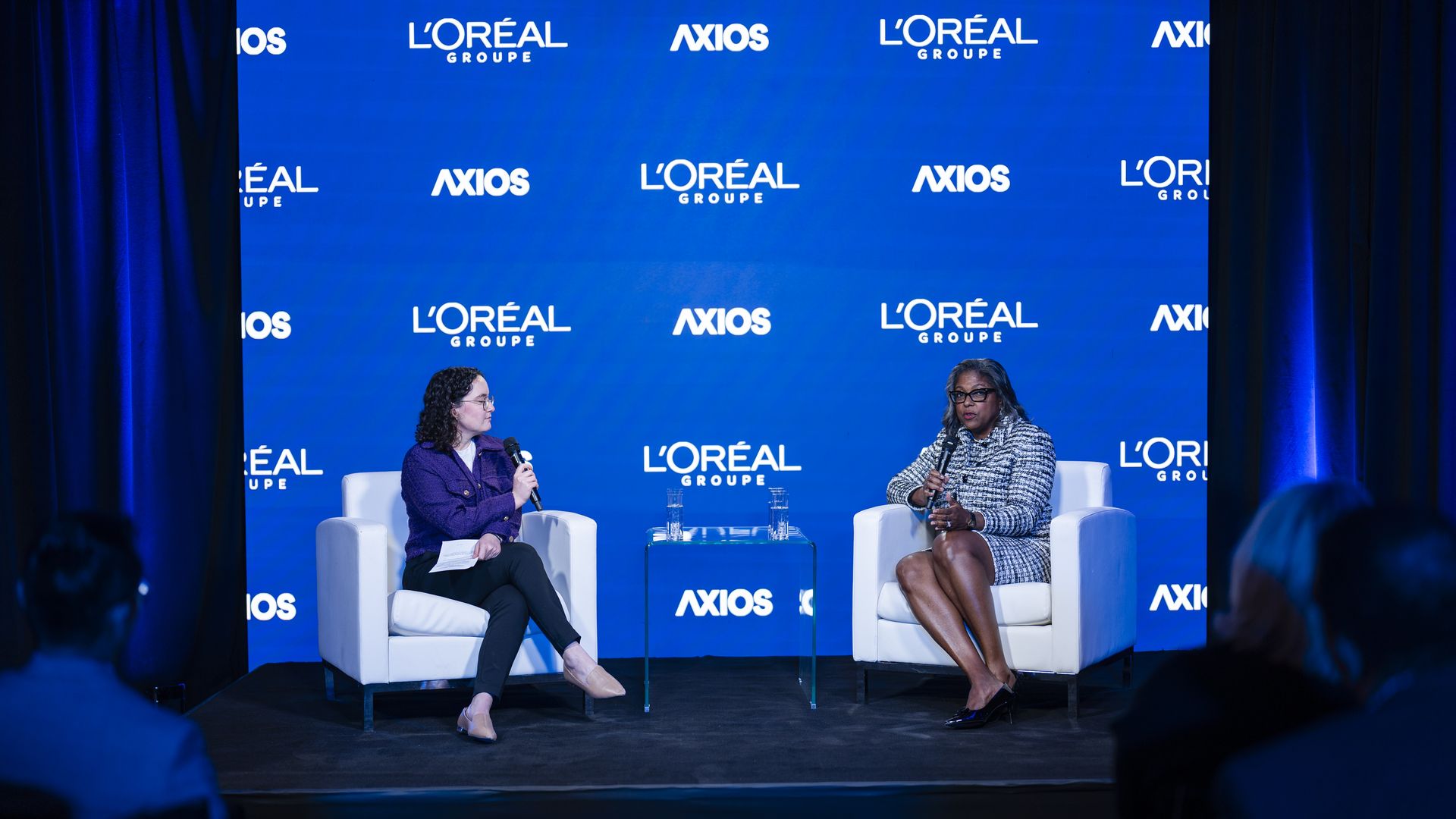 Axios’ Maya Goldman on stage in conversation with Dr. Andrea A. Hayes Dixon.