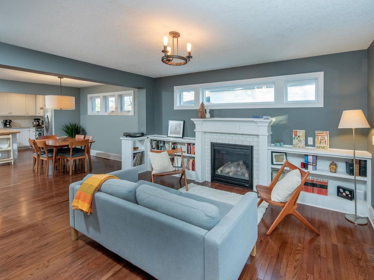 open concept living and dining area with view of kitchen